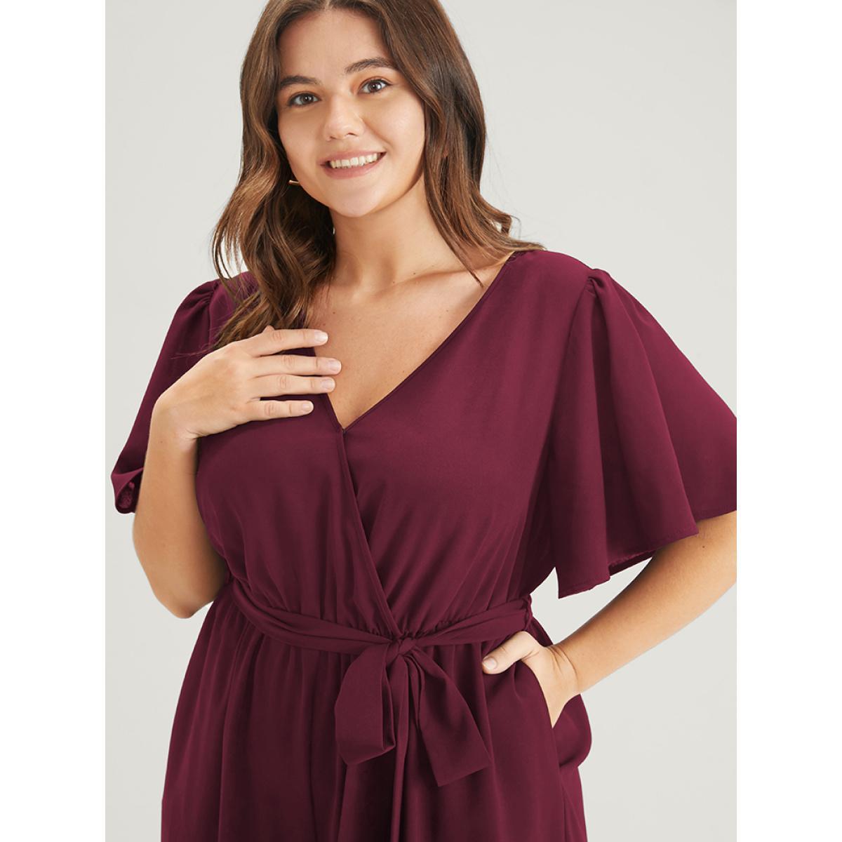 Plus Size Maroon Plain Scalloped Pocket Ruffles Button Belted Laser Cut Wrap Jumpsuit Women Elegant Short sleeve V-neck Dailywear Loose Jumpsuits BloomChic 12/L Product Image