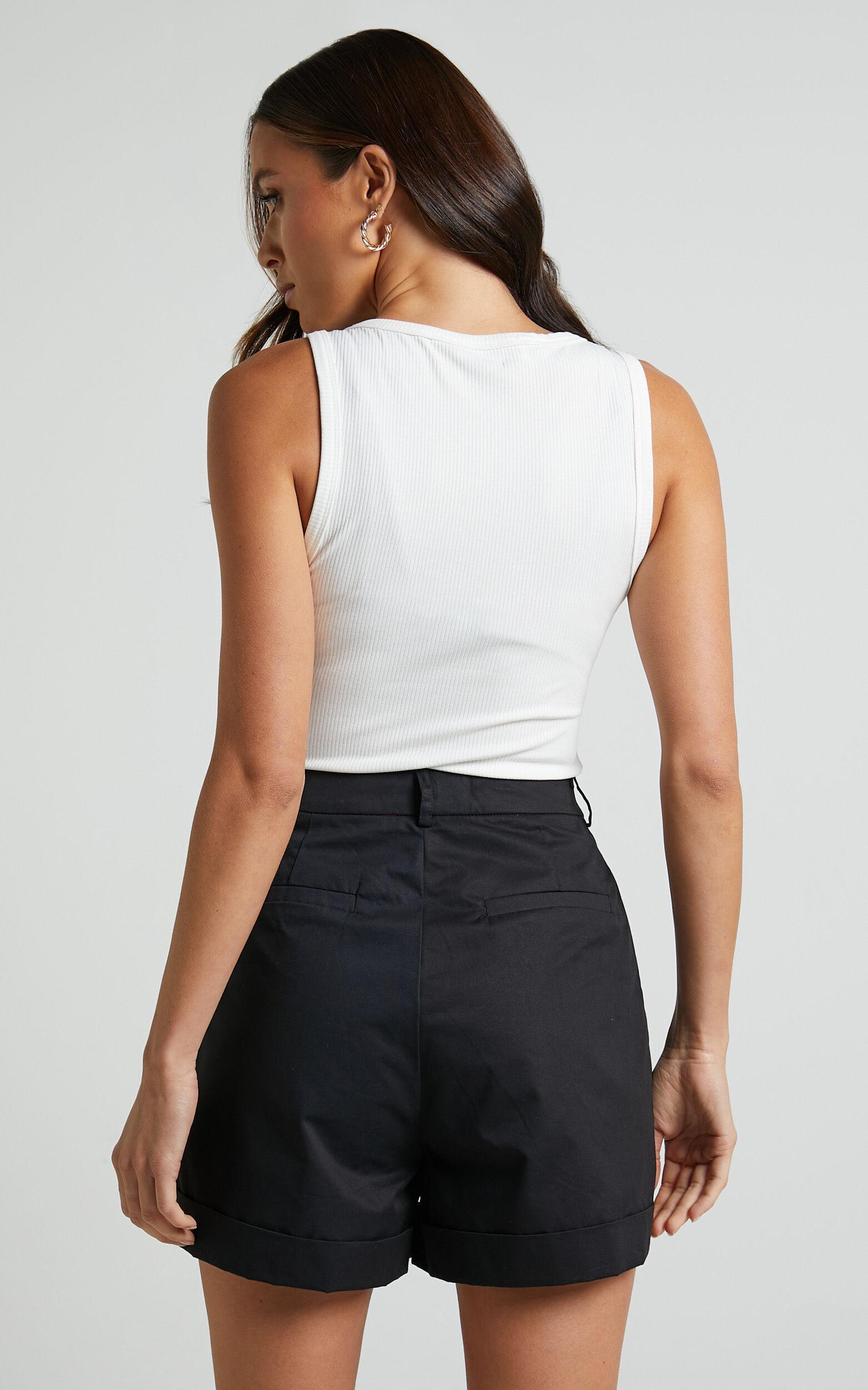 Khaimy Shorts - High Waisted Cuffed Shorts in Black Product Image