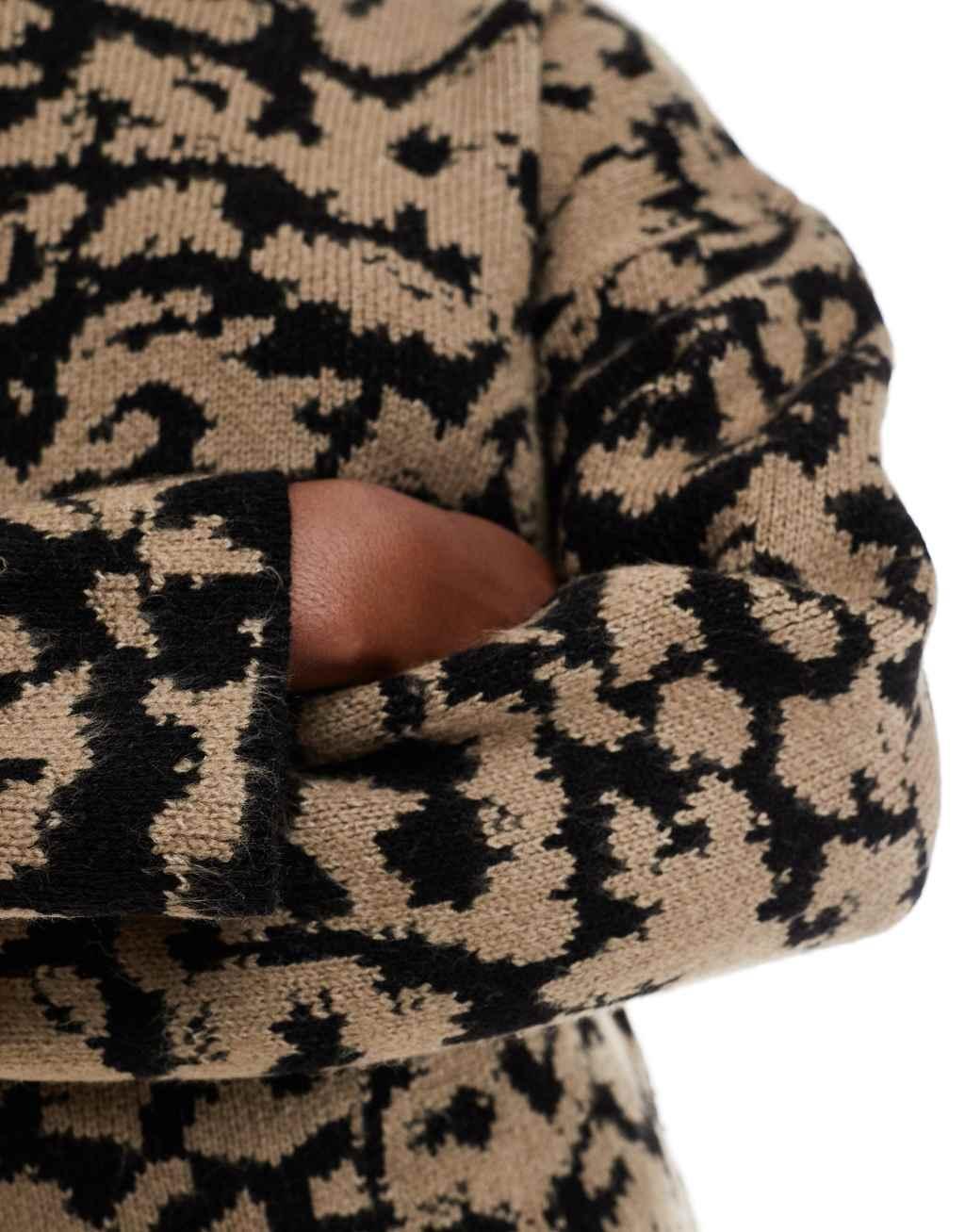 ASOS DESIGN crew neck knitted sweater in abstract leopard print Product Image