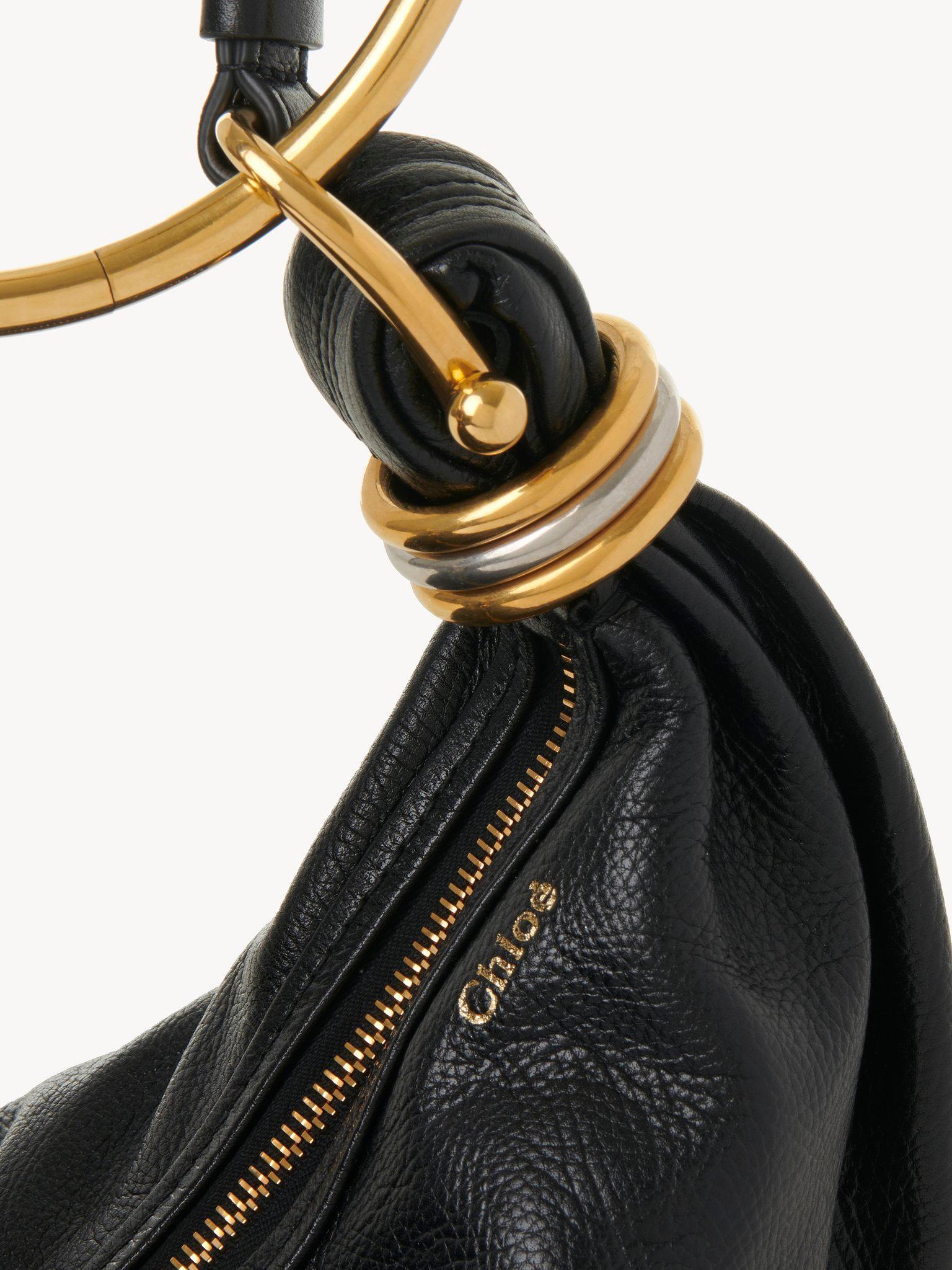 Small Bracelet hobo bag in grained leather Product Image