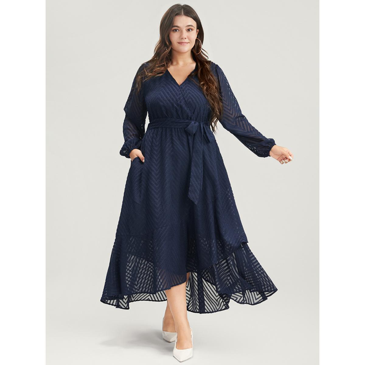 Plus Size Solid Geometric Wrap Pocket Belted Asymmetrical Hem Dress DarkBlue Women Glamour Plain V-neck Long Sleeve Curvy Long Dress BloomChic 26/4X Product Image