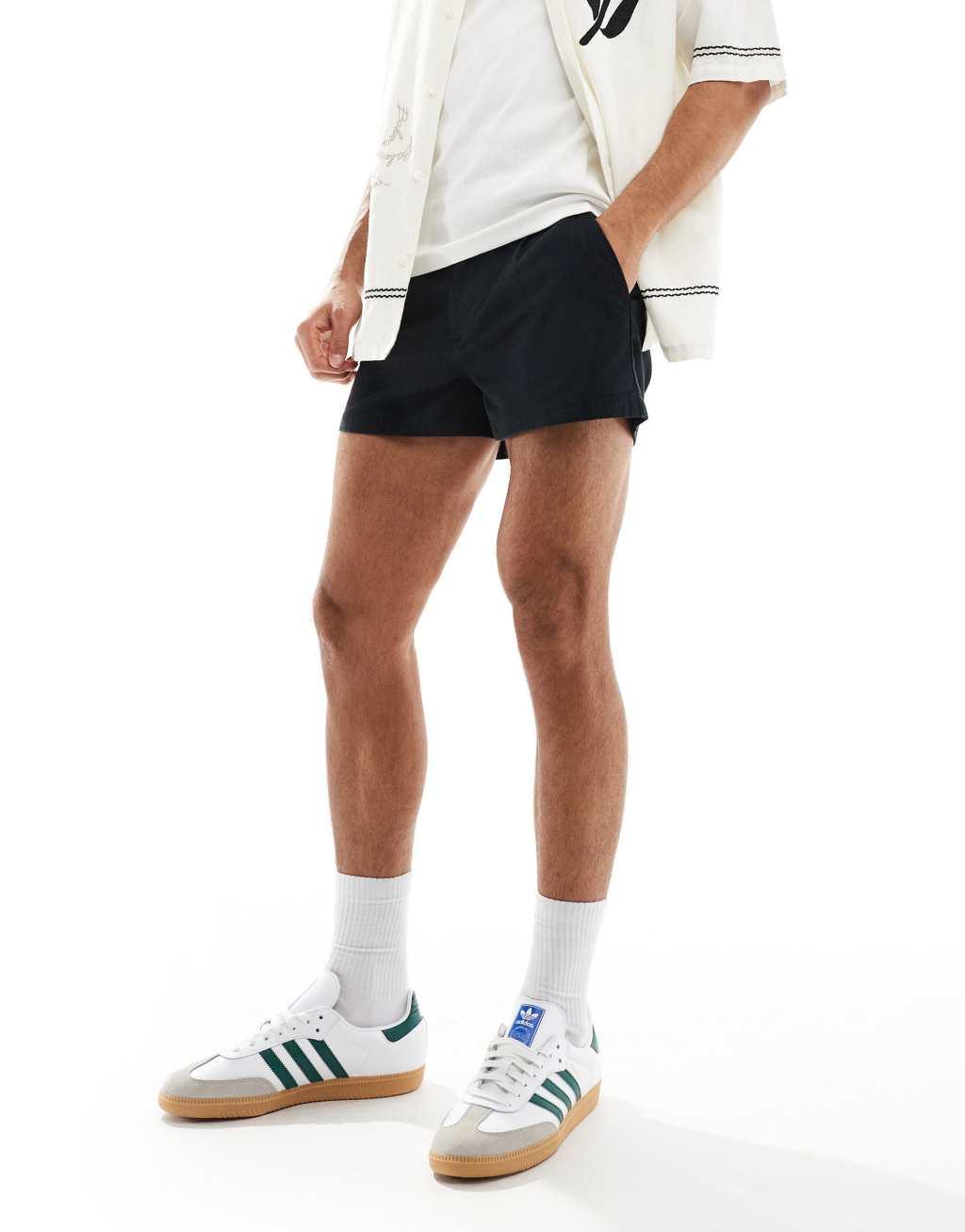 ASOS DESIGN pleated chino shorts in black Product Image