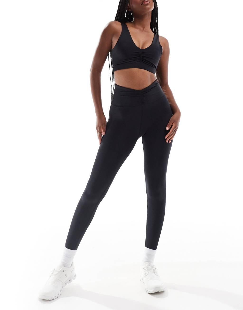 4505 ruched front light support sports bra in high shine black  Product Image
