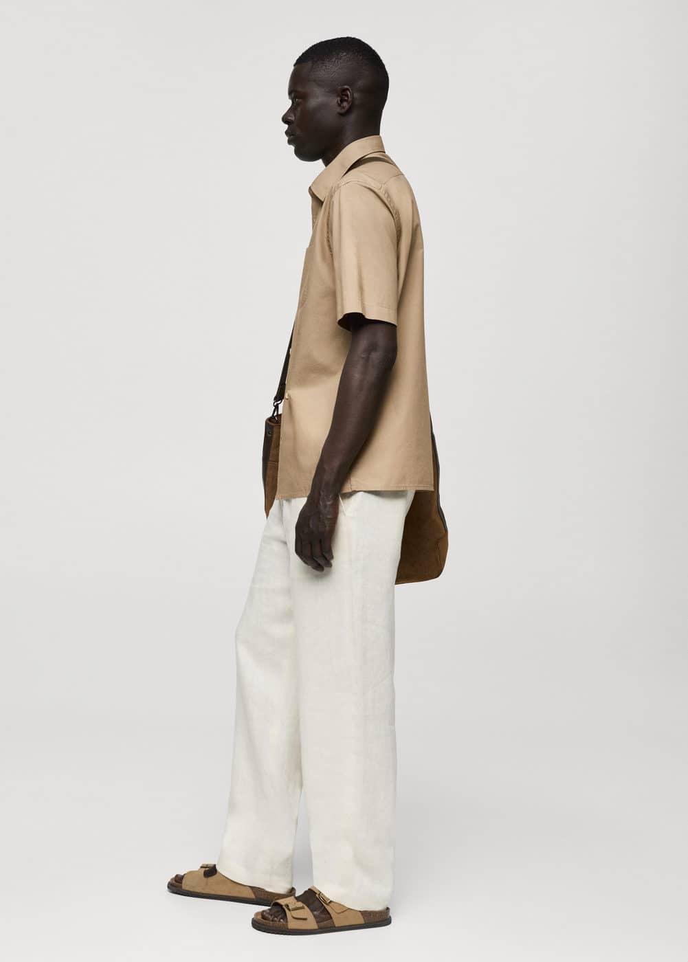 Tencel™™ cotton shirt with pocket - Men | MANGO USA Product Image