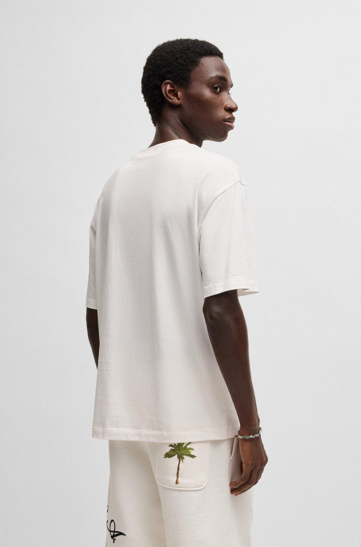 Cotton-jersey T-shirt with palm-tree print Product Image