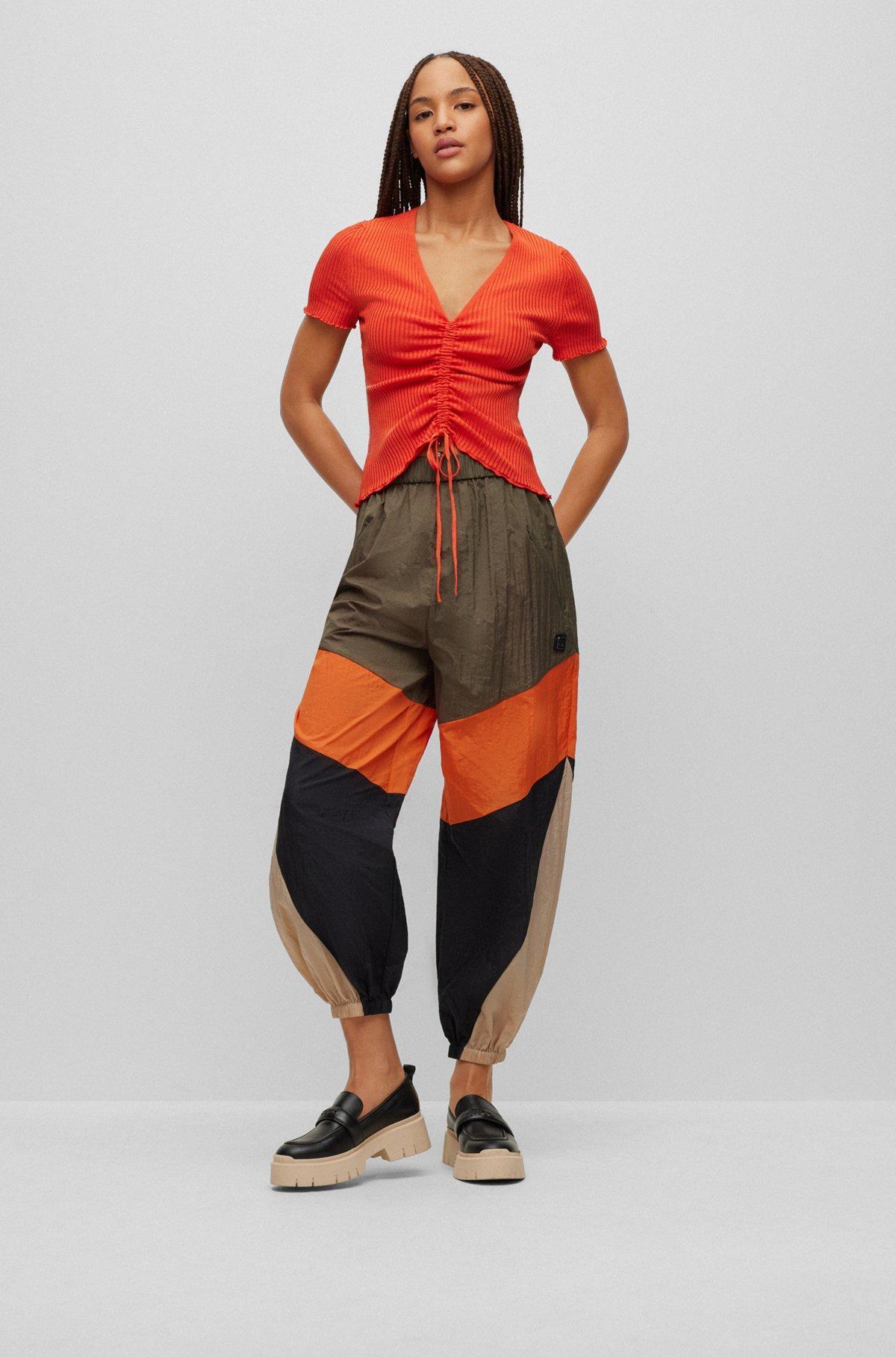 Short-sleeved ribbed sweater with gathered front Product Image