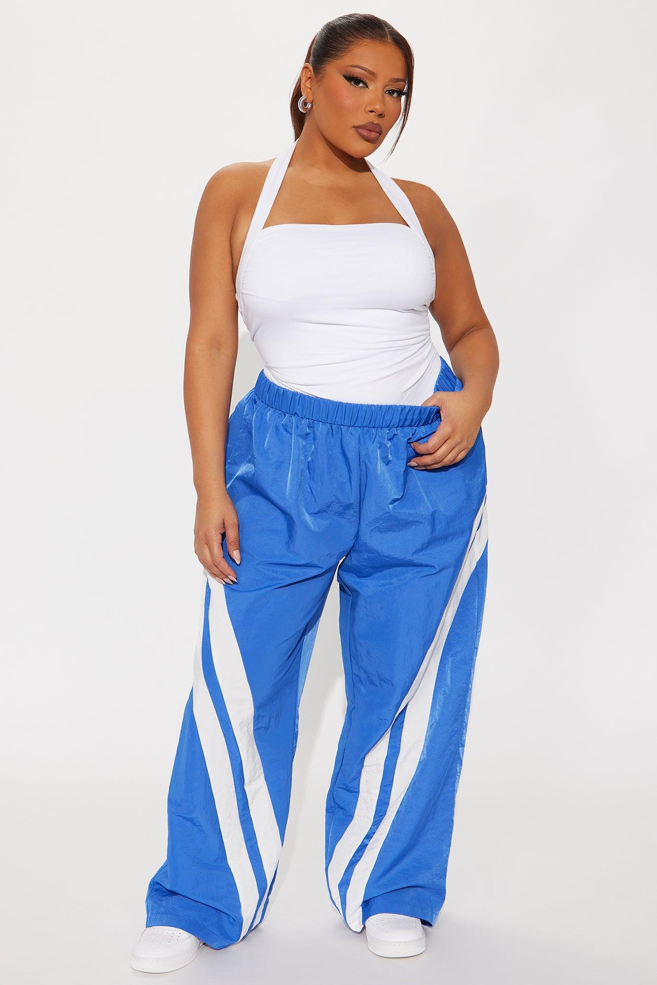 Follow The Curve Windbreaker Track Pant - Blue Product Image