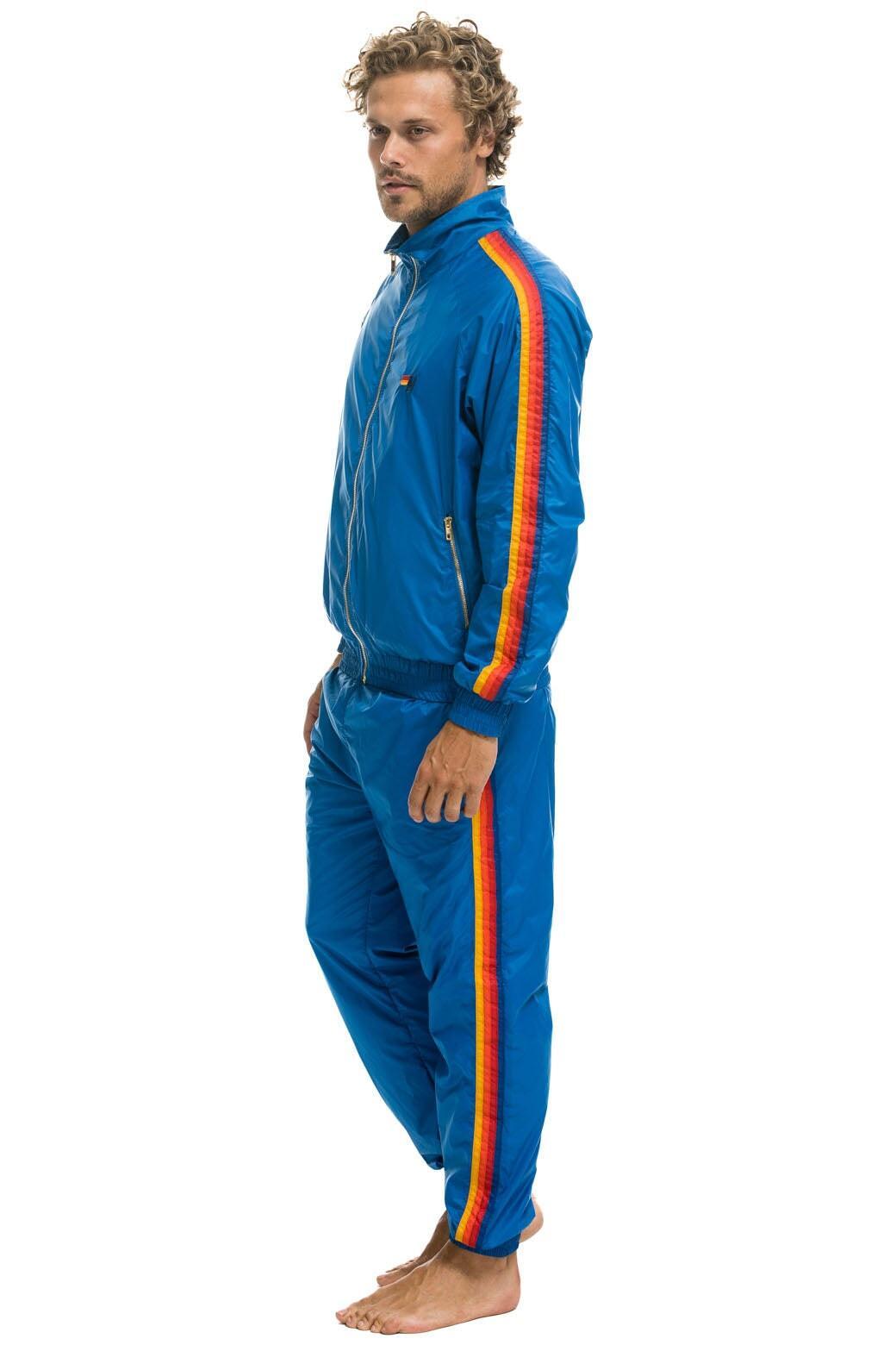 MEN'S 4 STRIPE WIND PANT - SNORKEL BLUE Male Product Image