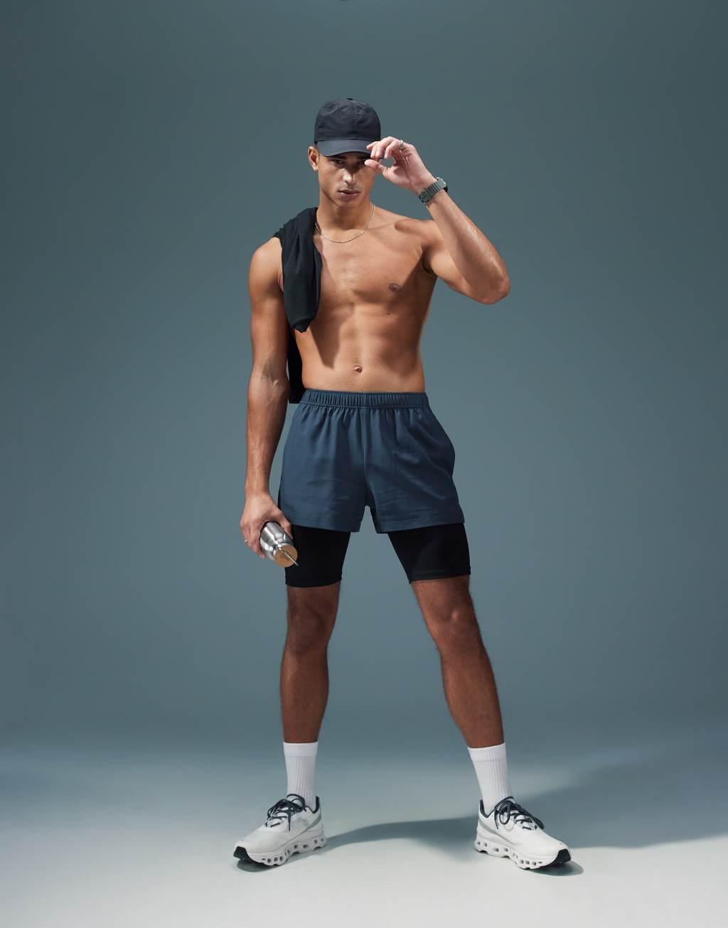 4505 Icon training base layer legging shorts with quick dry and phone pocket in black  Product Image