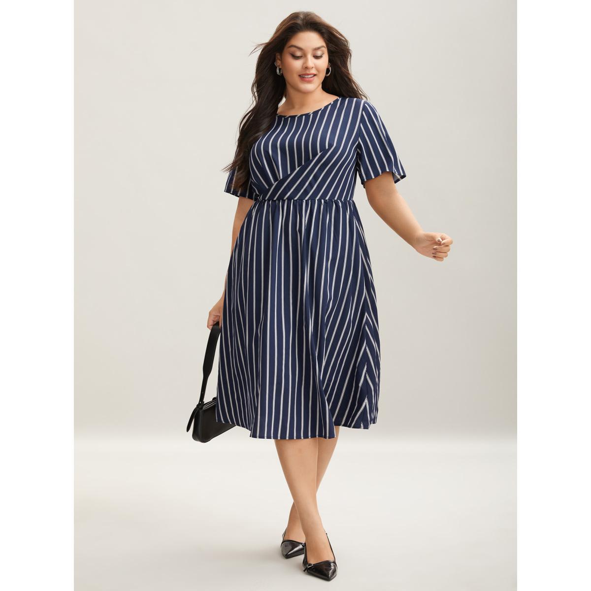 Plus Size Striped Stretchy Waist Defining Pockets Dress Indigo Women At the Office Pleated Round Neck Short sleeve Curvy BloomChic 26/4X Product Image