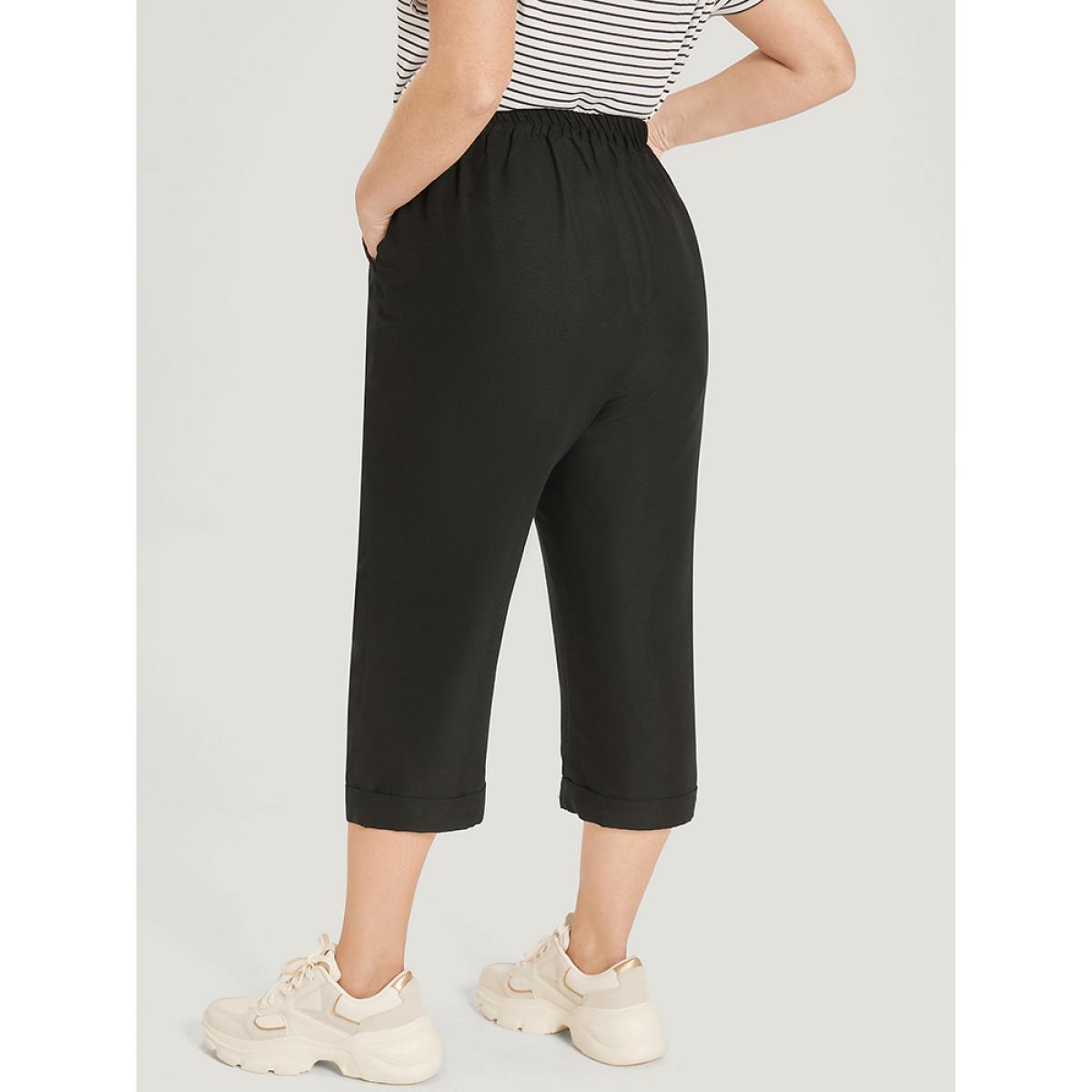 Plus Size Solid Pocket Button Detail Elastic Waist Pants Women Black Casual High Rise Dailywear Pants BloomChic 30/6X Product Image