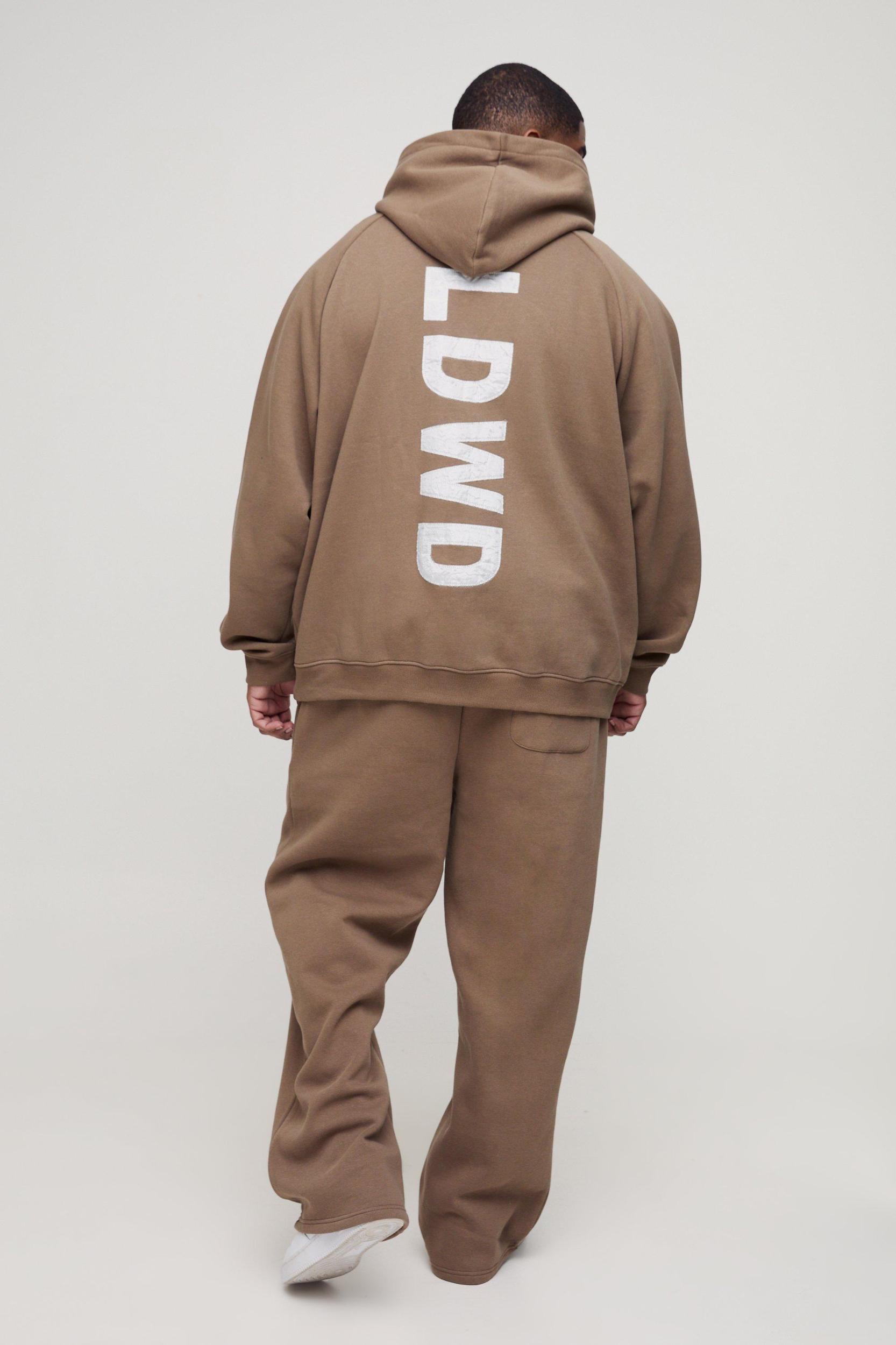 Plus Relaxed Satin Applique WRLDWD Joggers | boohooMAN USA Product Image