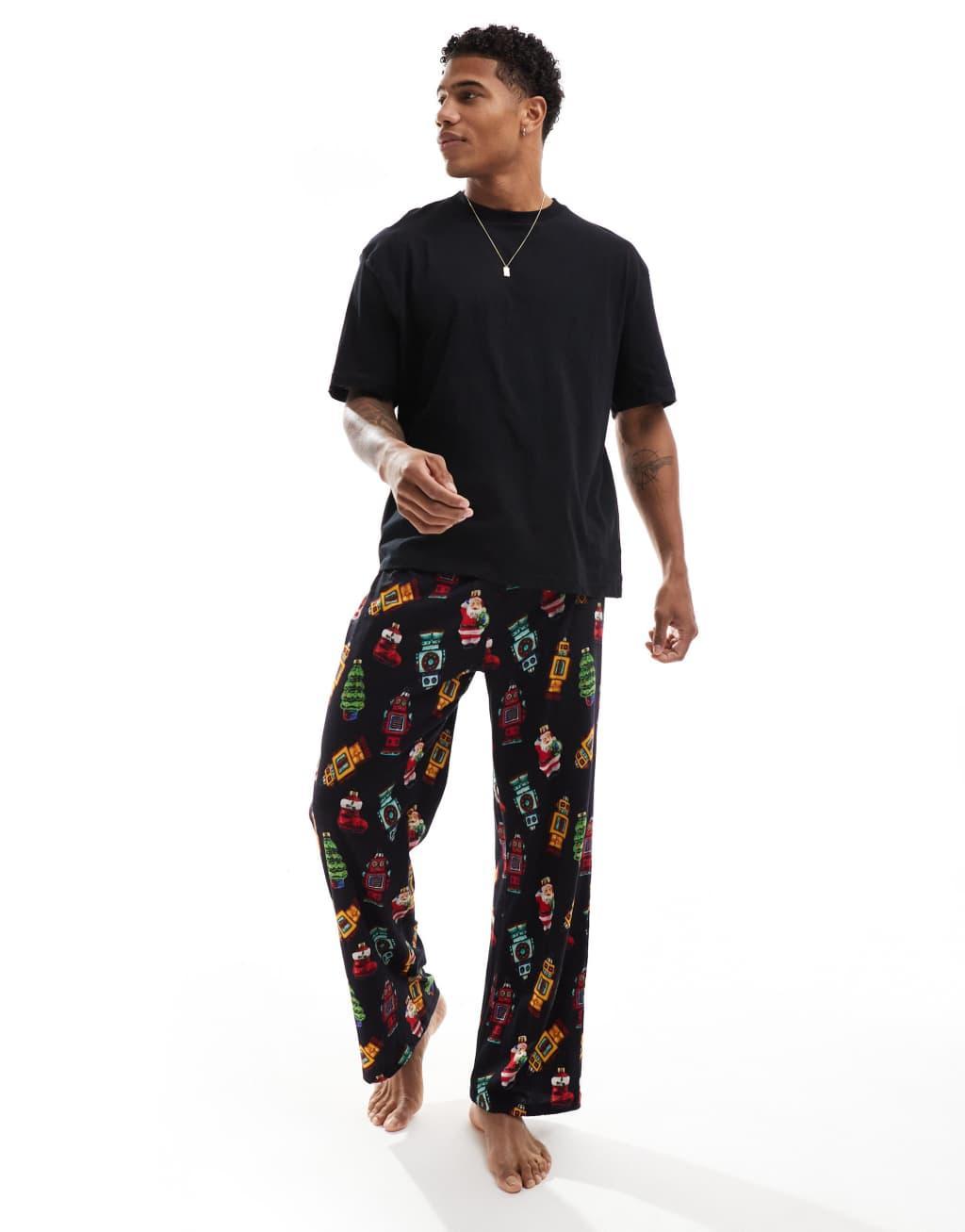 ASOS DESIGN pajama set with Christmas decs in black Product Image