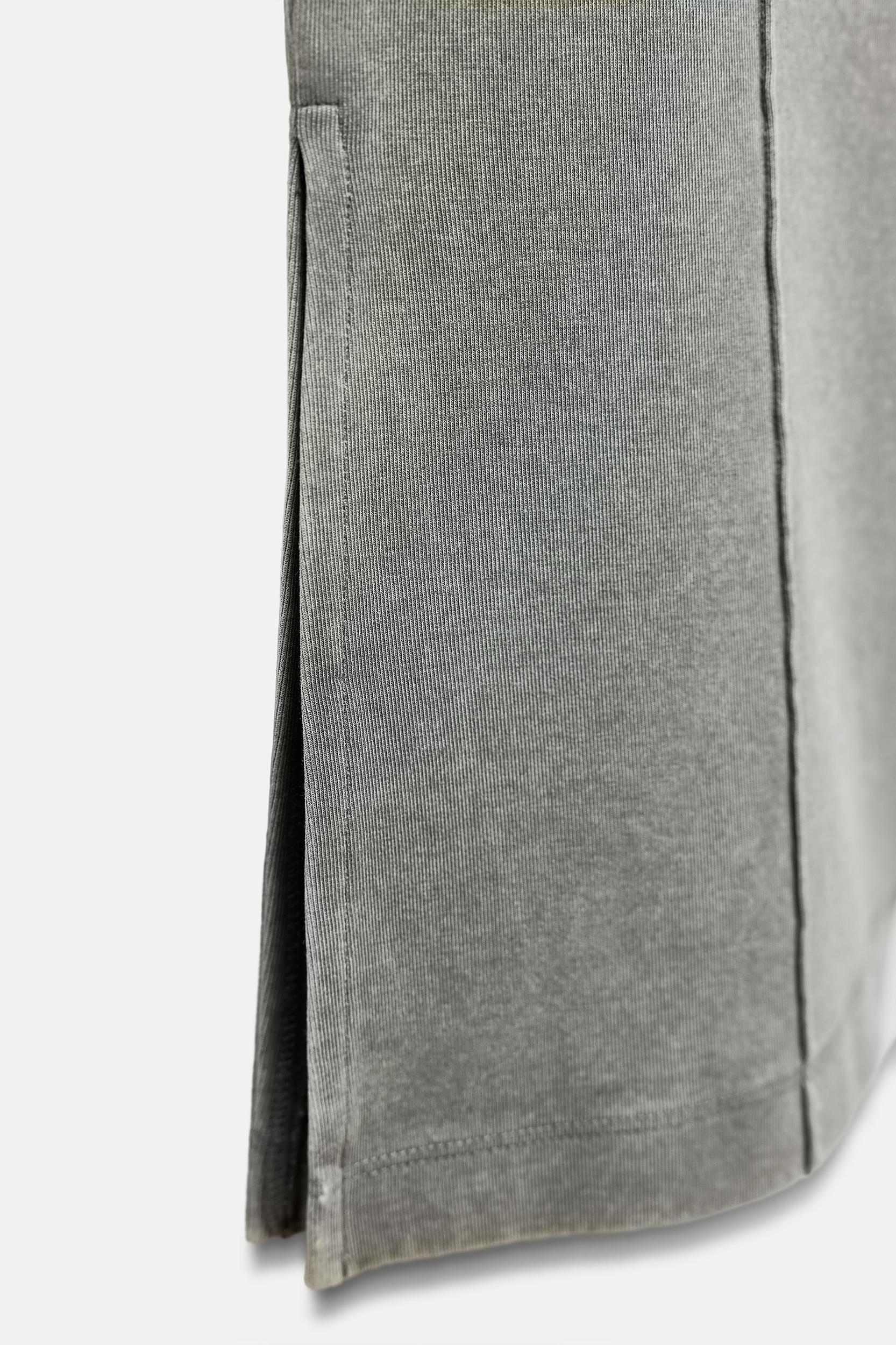 WASHED EFFECT FLARED INTERLOCK PANTS Product Image
