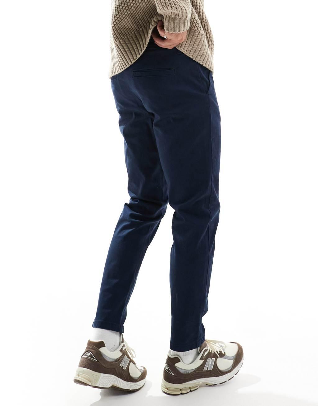 ASOS DESIGN tapered chinos in navy Product Image
