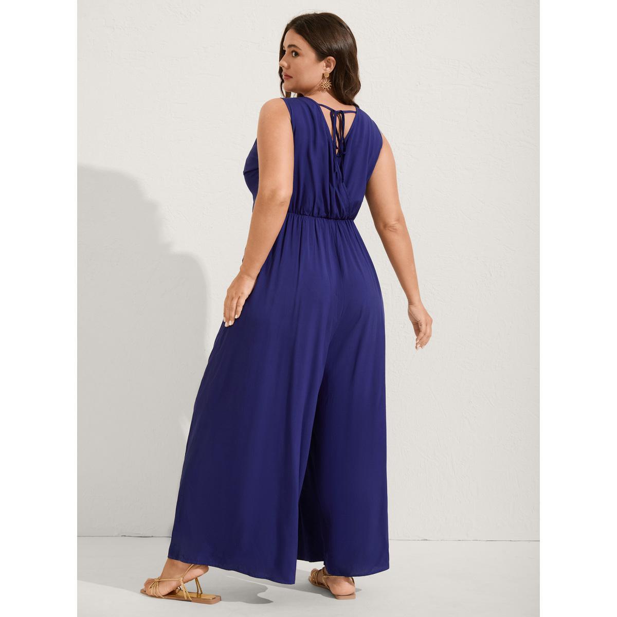 Plus Size Indigo Rayon Floral Embroidery Stretchy Waist Jumpsuit Women Sleeveless V-neck Vacation Loose Jumpsuits BloomChic 12/L Product Image