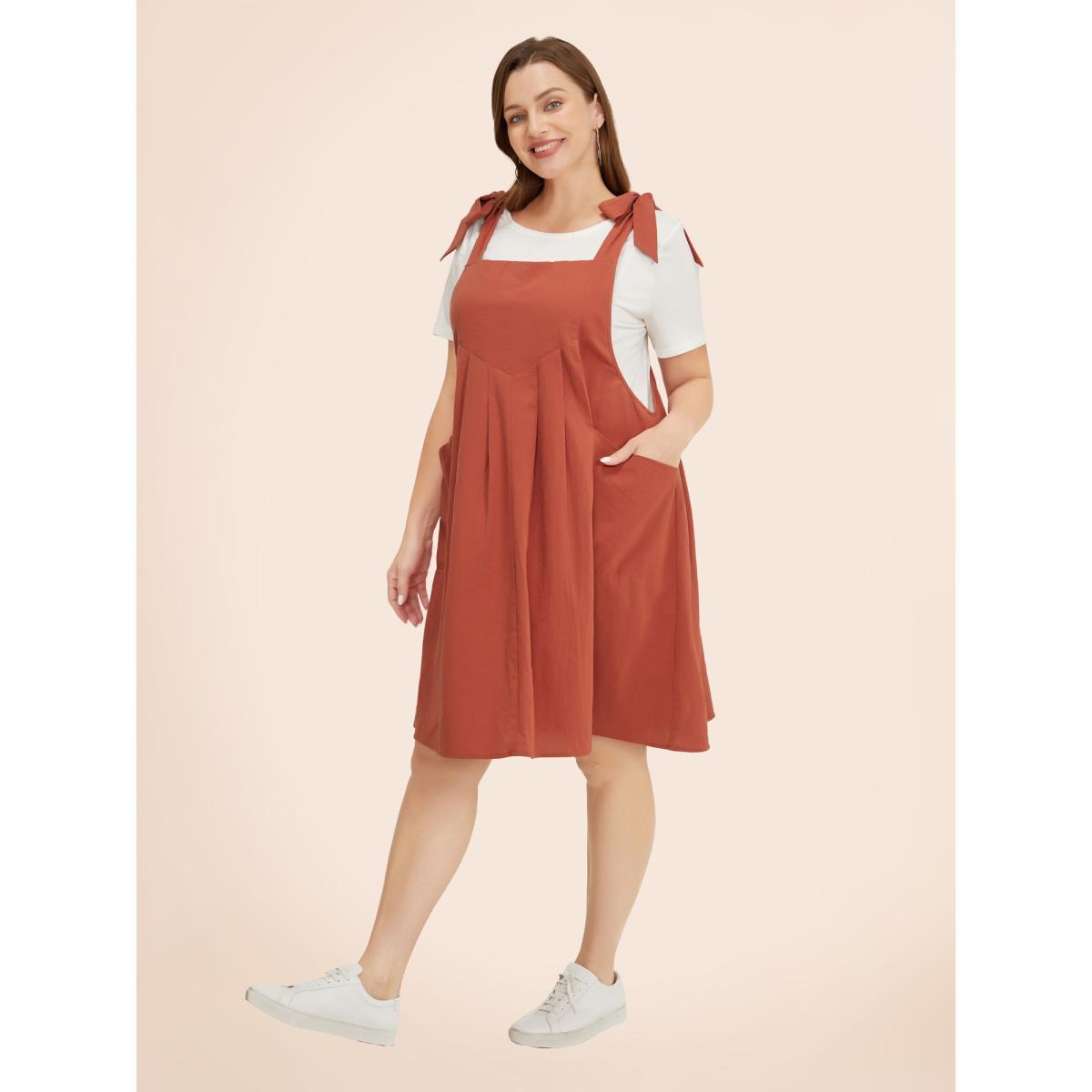 Plus Size Solid Pleated Hem Pocket Tie Shoulder Overall Dress Rust Women Casual Pleated Spaghetti Strap Sleeveless Curvy Knee Dress BloomChic 26/4X Product Image
