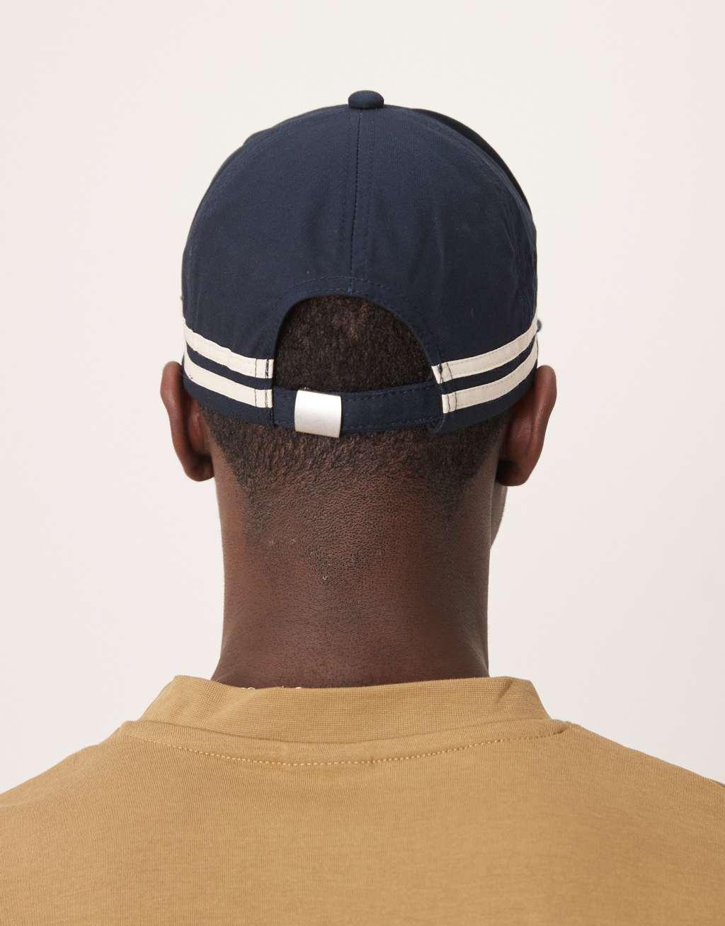 ASOS DESIGN cap with graphic in navy Product Image