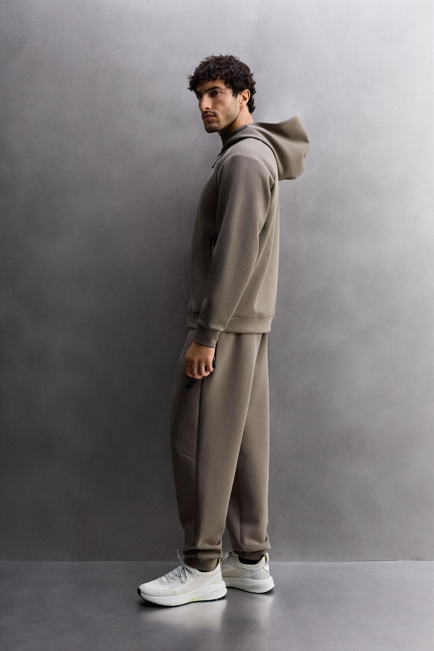 TECHNICAL ZIP-UP HOODIE Product Image