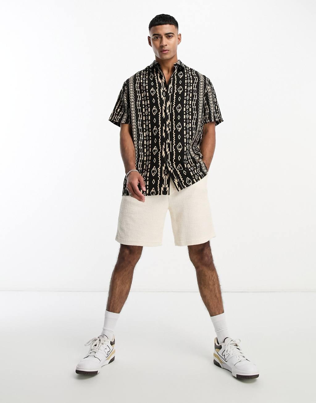 ASOS DESIGN relaxed shirt in black pattern print Product Image