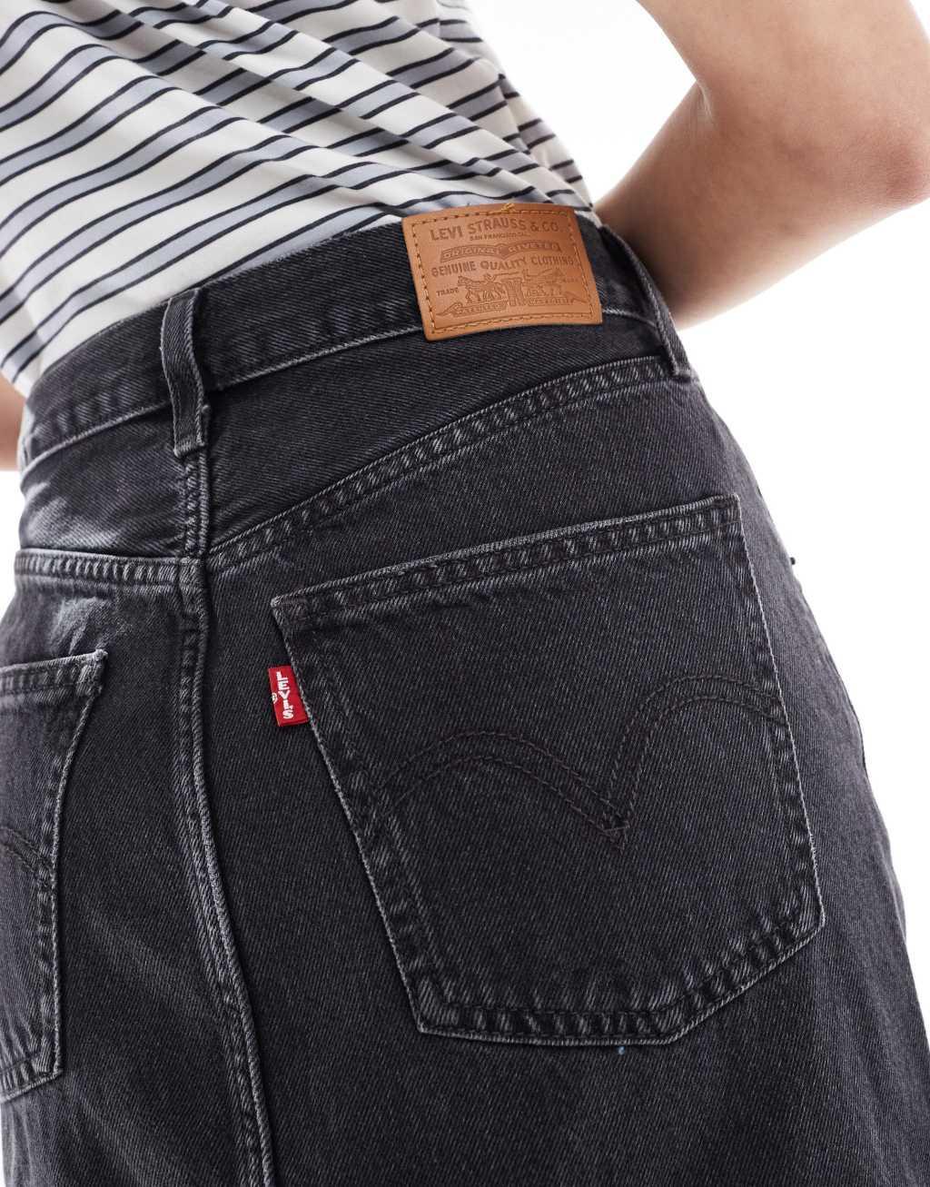 Levi's high rise midi skirt with back slit in washed black Product Image