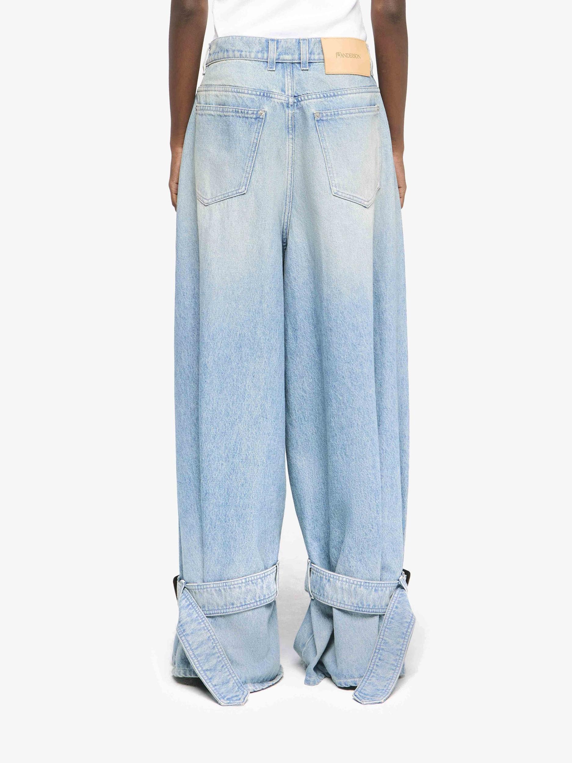 BUCKLED CUFF DENIM JEANS Product Image