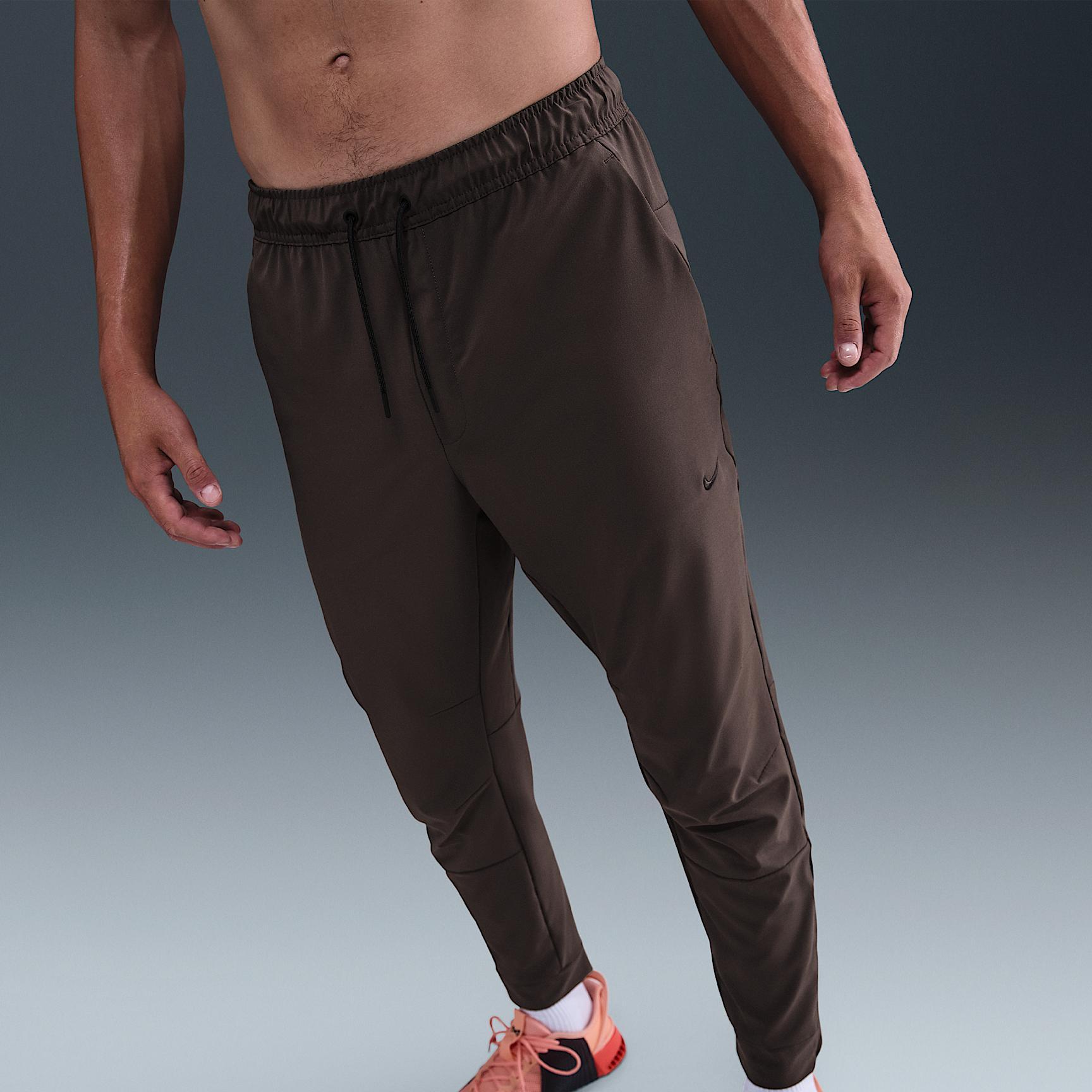 Nike Unlimited Men's Dri-FIT Zippered Cuff Versatile Pants Product Image