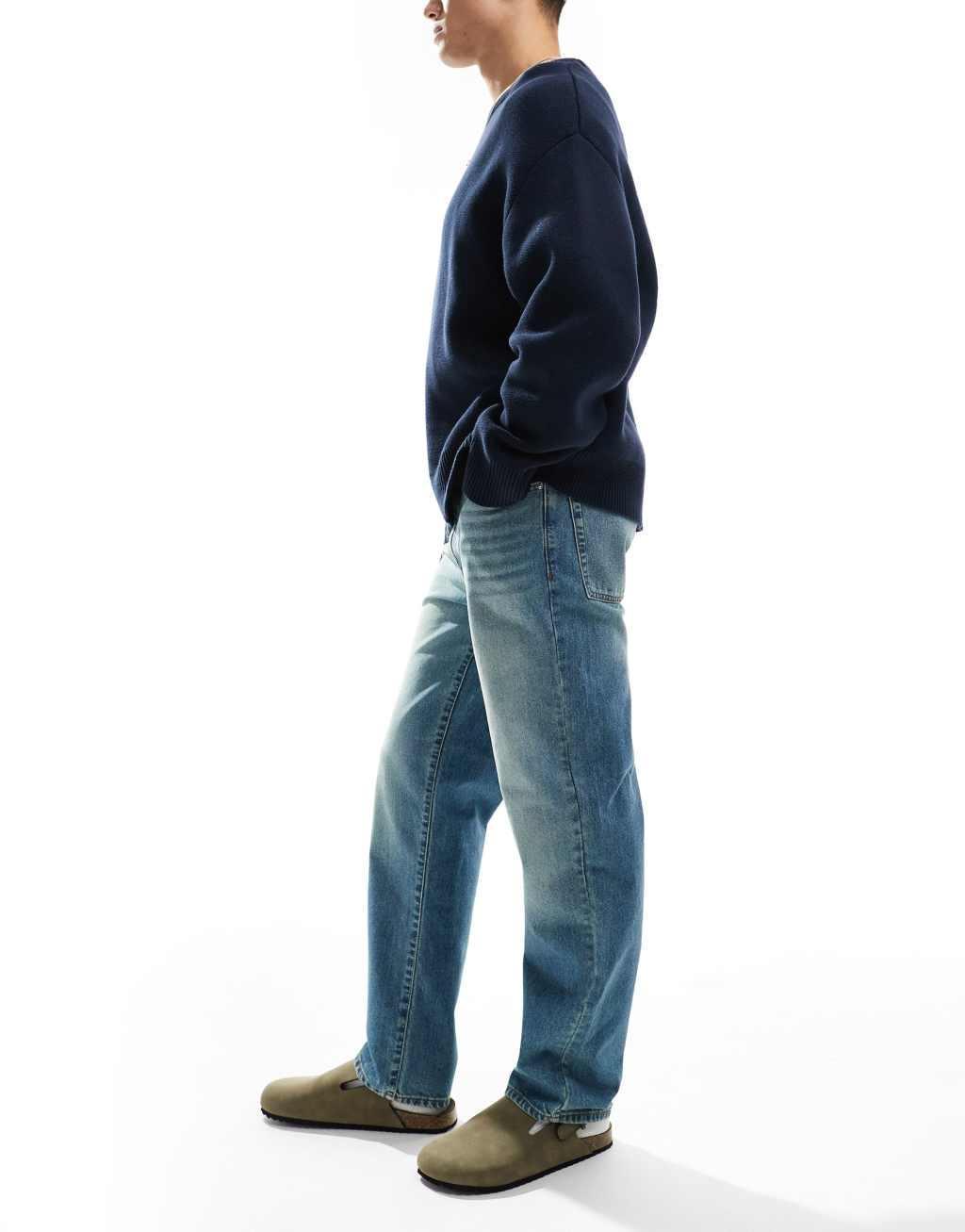ASOS DESIGN straight leg jeans in tinted vintage light wash blue Product Image