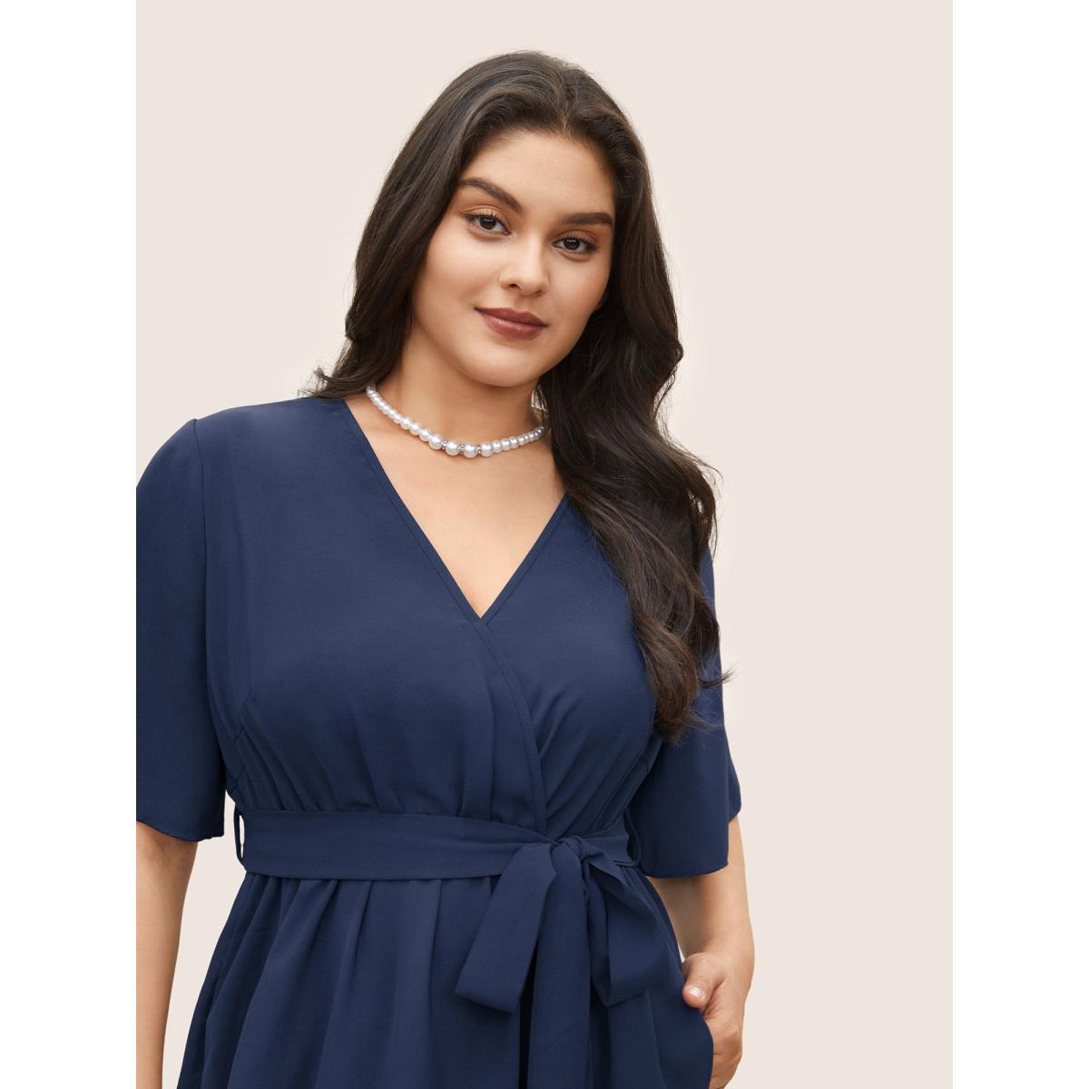 Plus Size Bloom Dress - Solid Tie Surplice Ruffle High Low Dress DarkBlue Women Elegant Cross straps V-neck Short sleeve Curvy Midi Dress BloomChic 22/3X Product Image