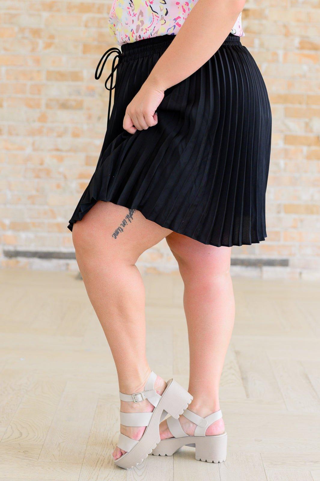 Just a Flirt Pleated Skirt in Black Product Image
