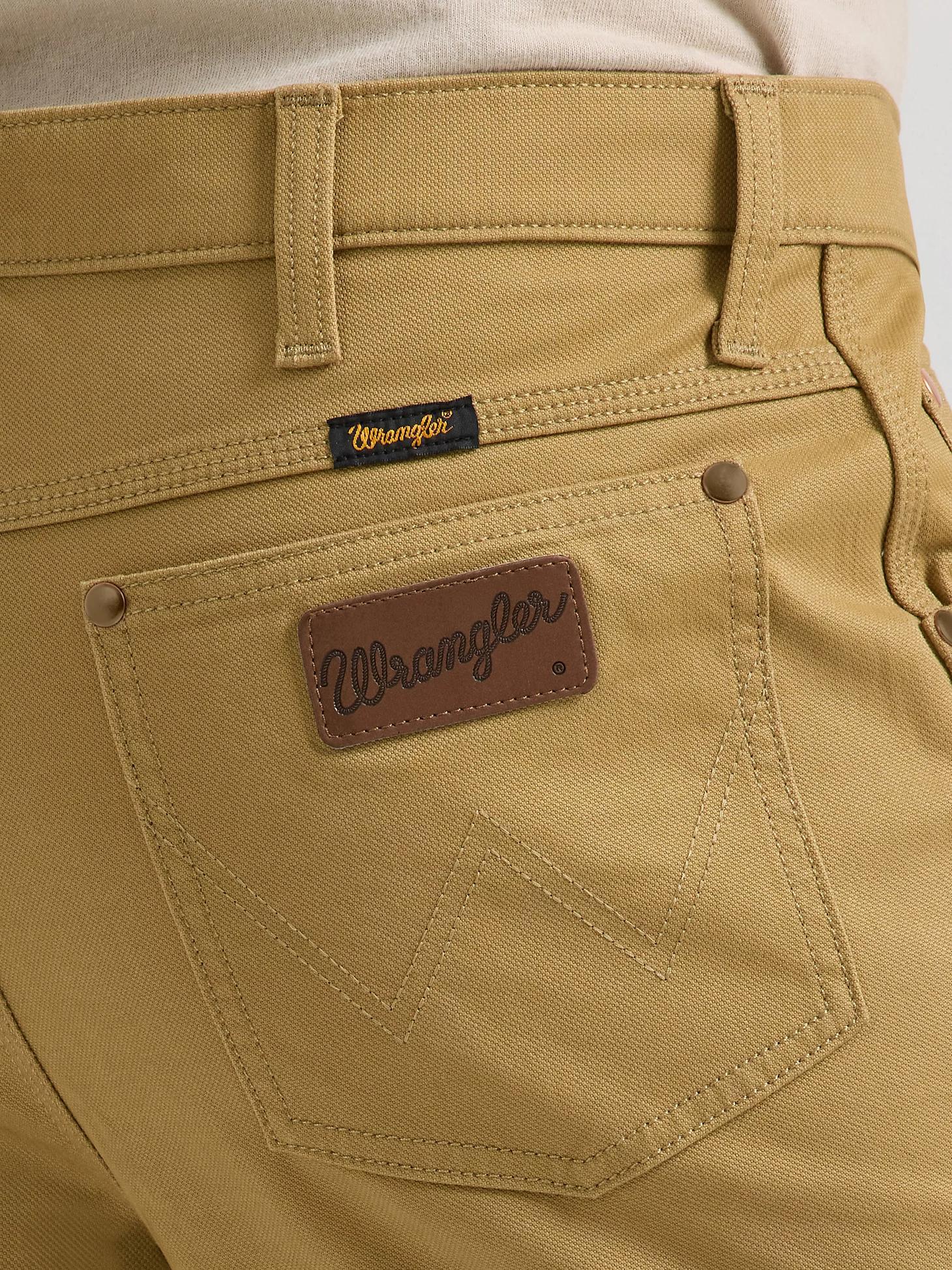 Premium Performance Tough Comfort Cowboy Cut® Slim Fit Canvas Jean | Men's JEANS | Wrangler® Product Image