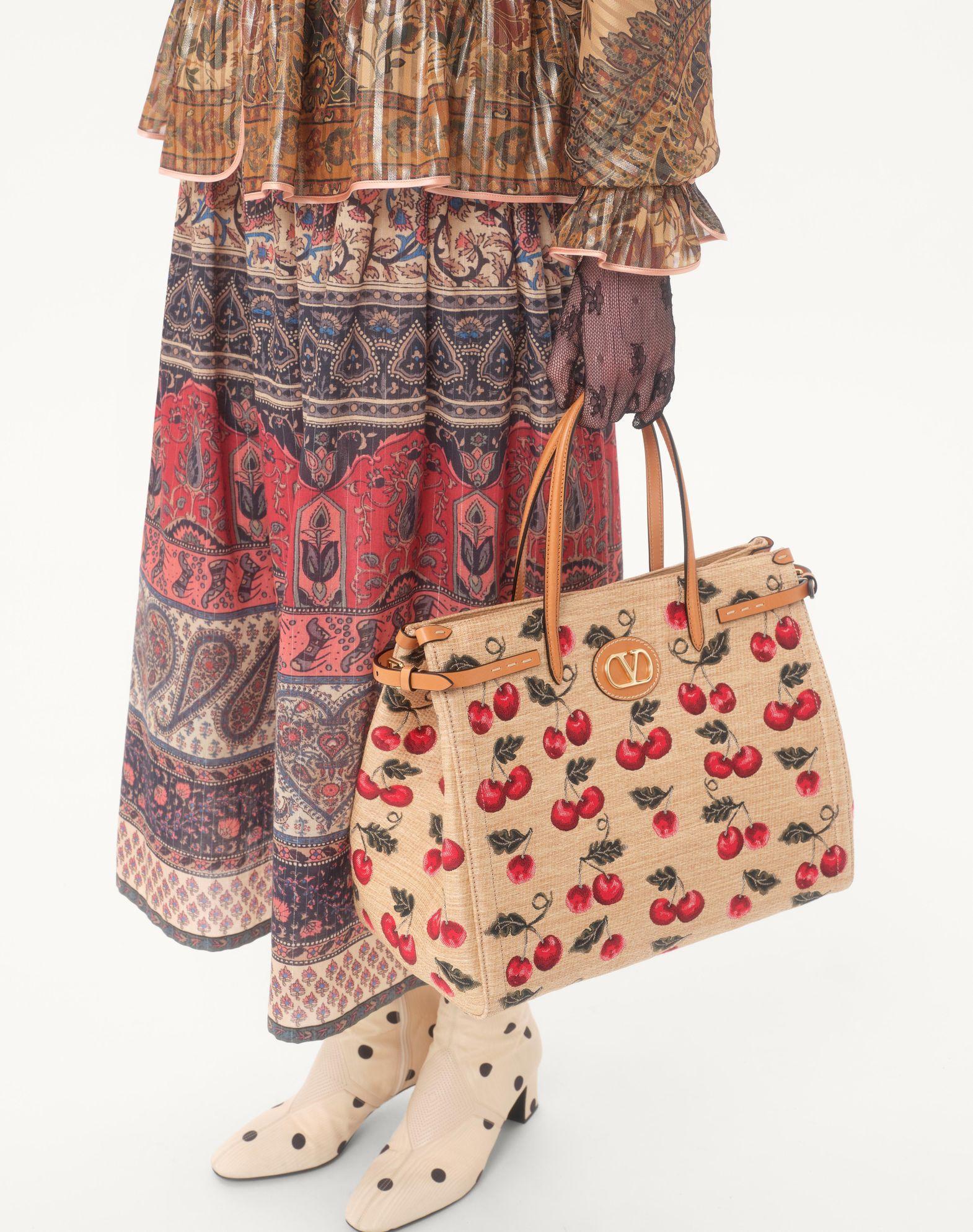 Valentino Garavani Antibes Medium Shopping Bag In Jacquard Raffia With Cherryfic Motif Product Image