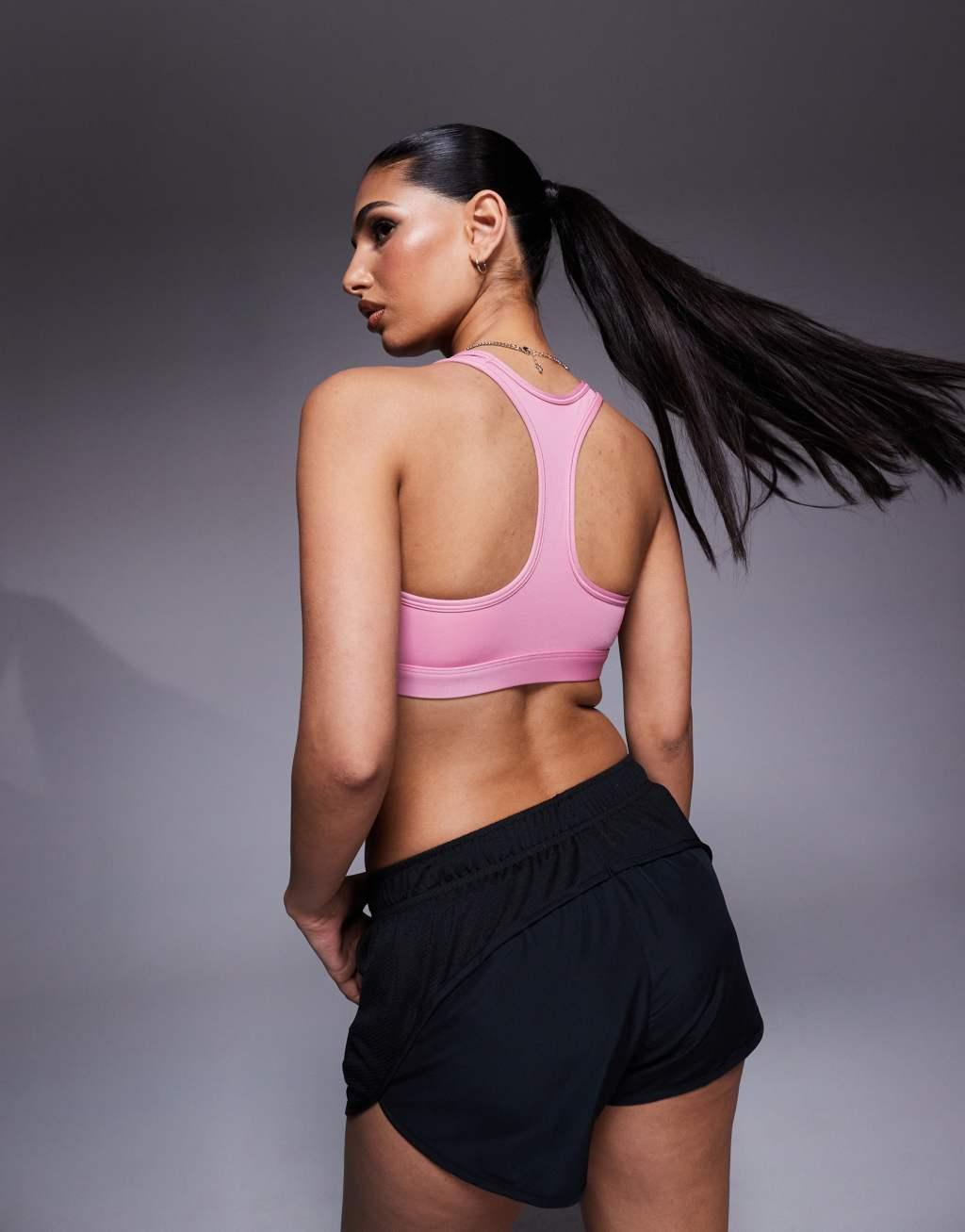 Nike Training swoosh medium support sports bra in pink Product Image