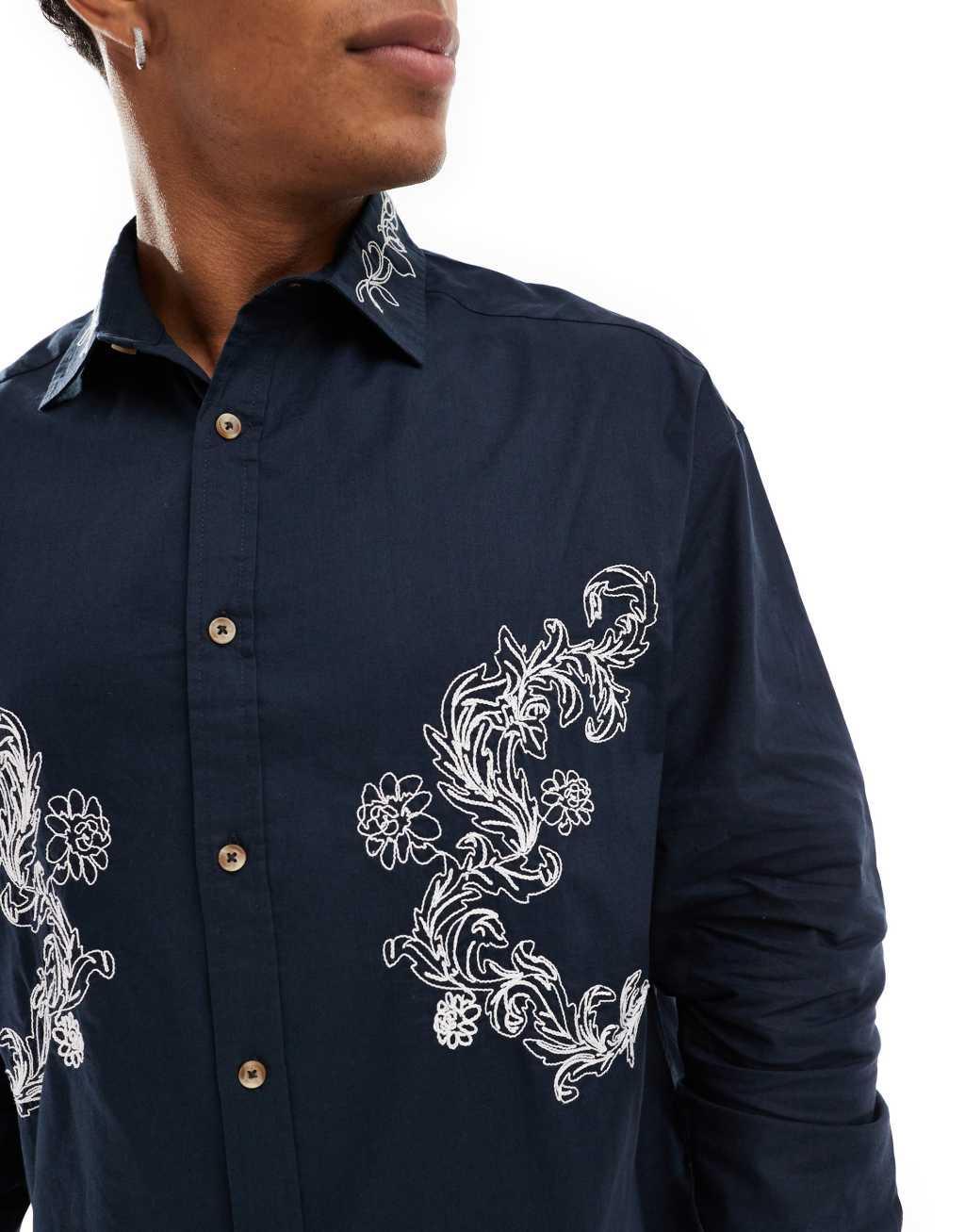 ASOS DESIGN 90s oversized shirt with floral embroidery in navy Product Image