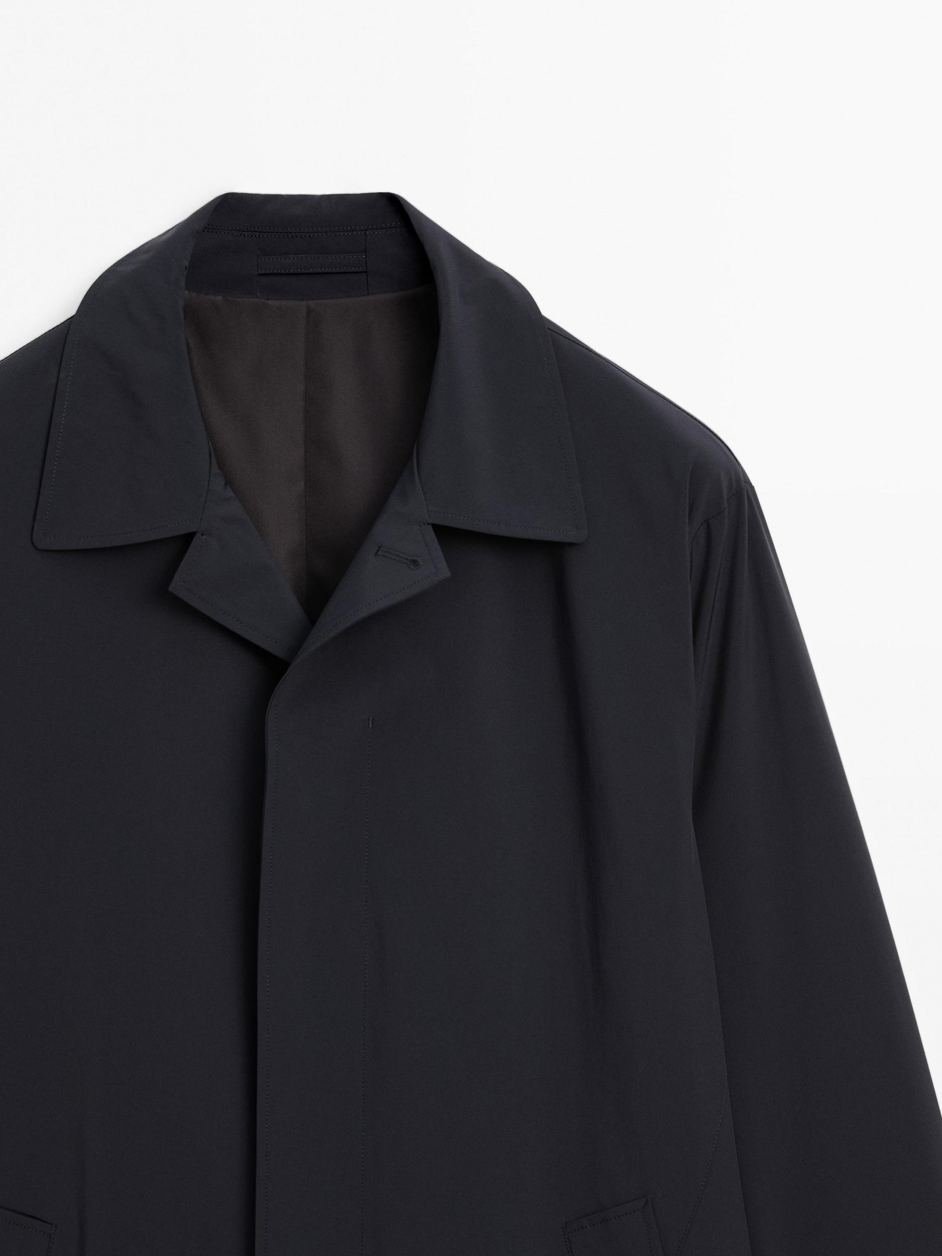 Lightweight trench coat with hidden buttons Product Image