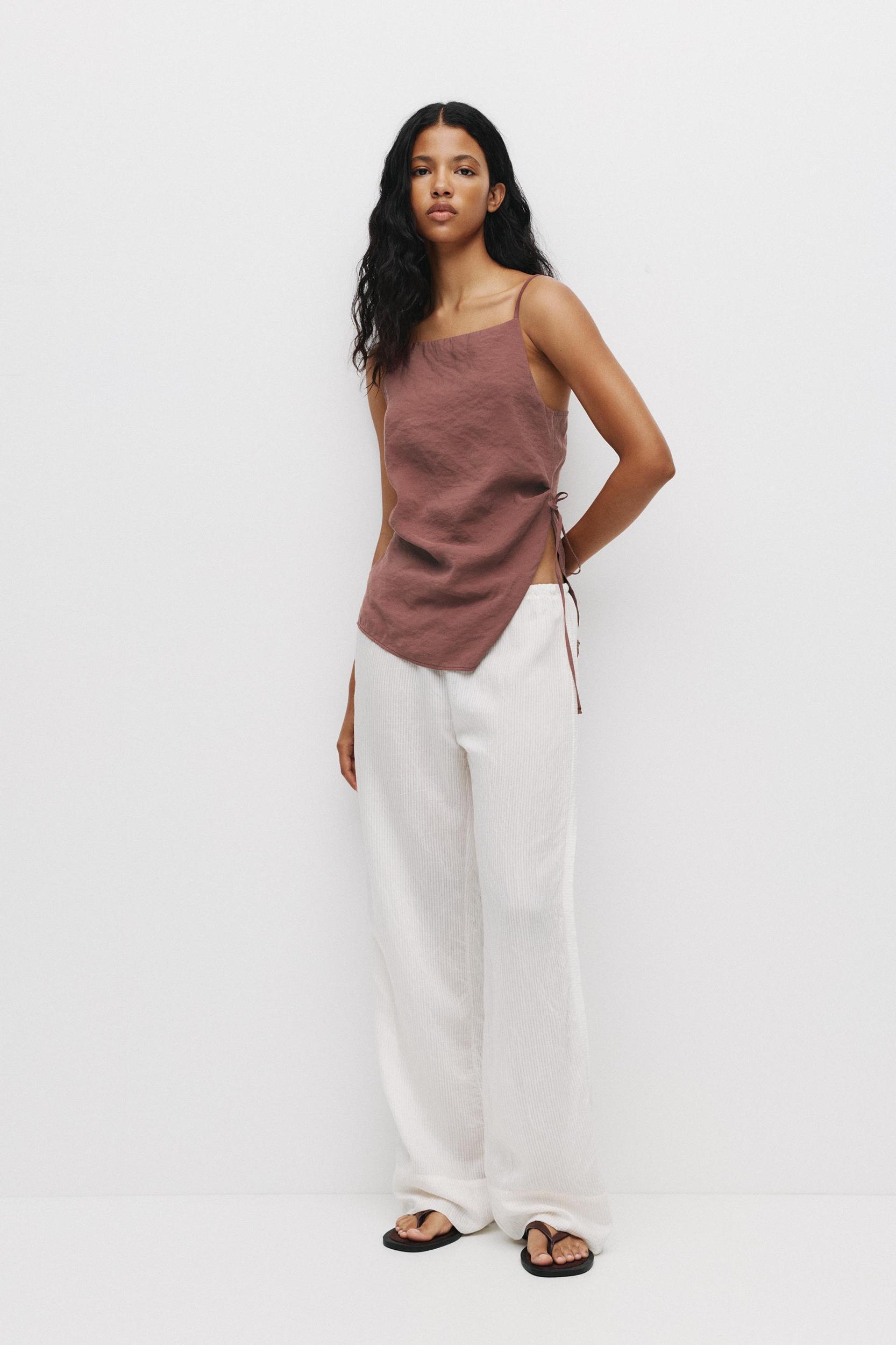 Asymmetric strappy top Product Image