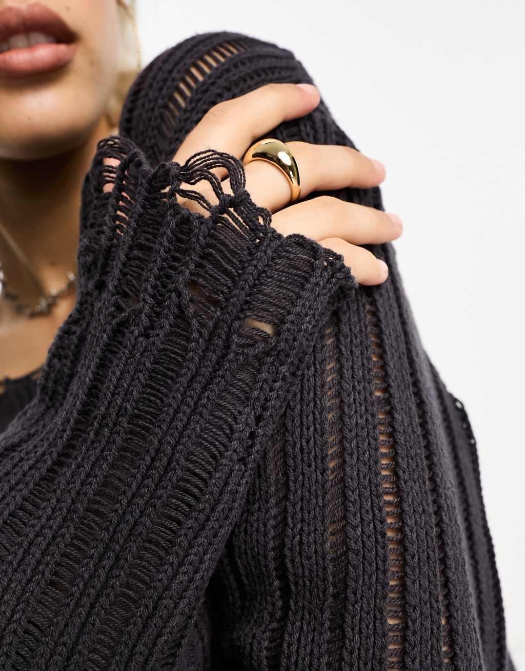 COLLUSION cropped distressed nibbled hem sweater Product Image