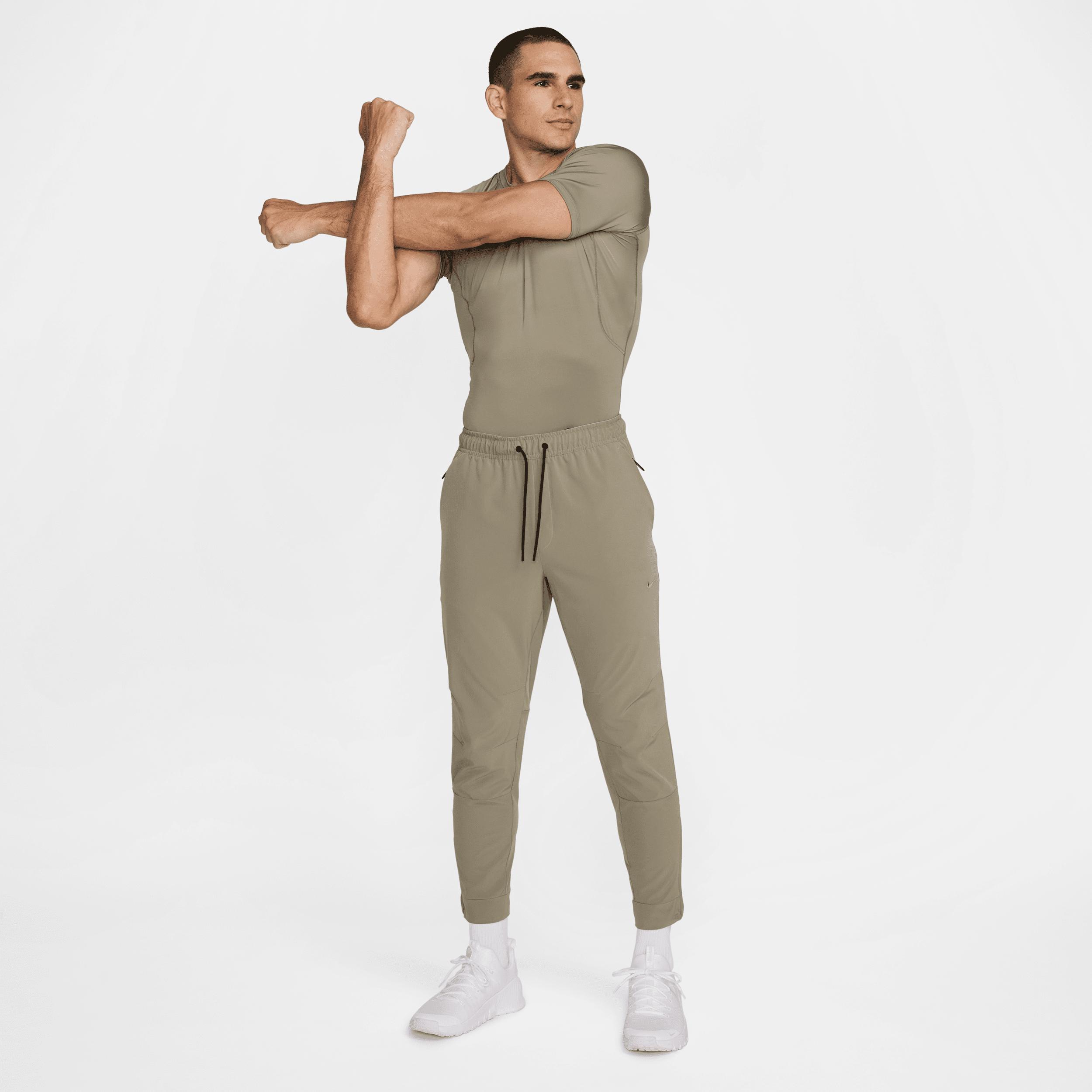 Nike Unlimited Men's Dri-FIT Zippered Cuff Versatile Pants Product Image