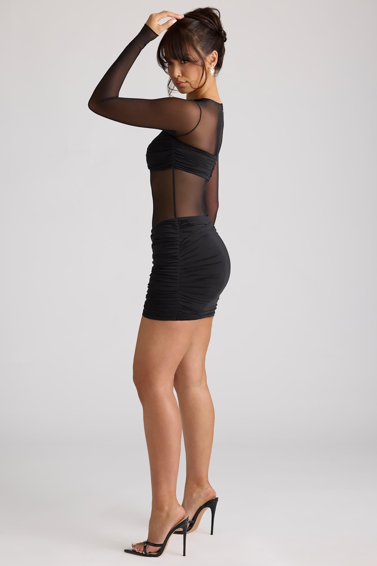 Sheer Panelled Long Sleeve Mini Dress in Black Product Image
