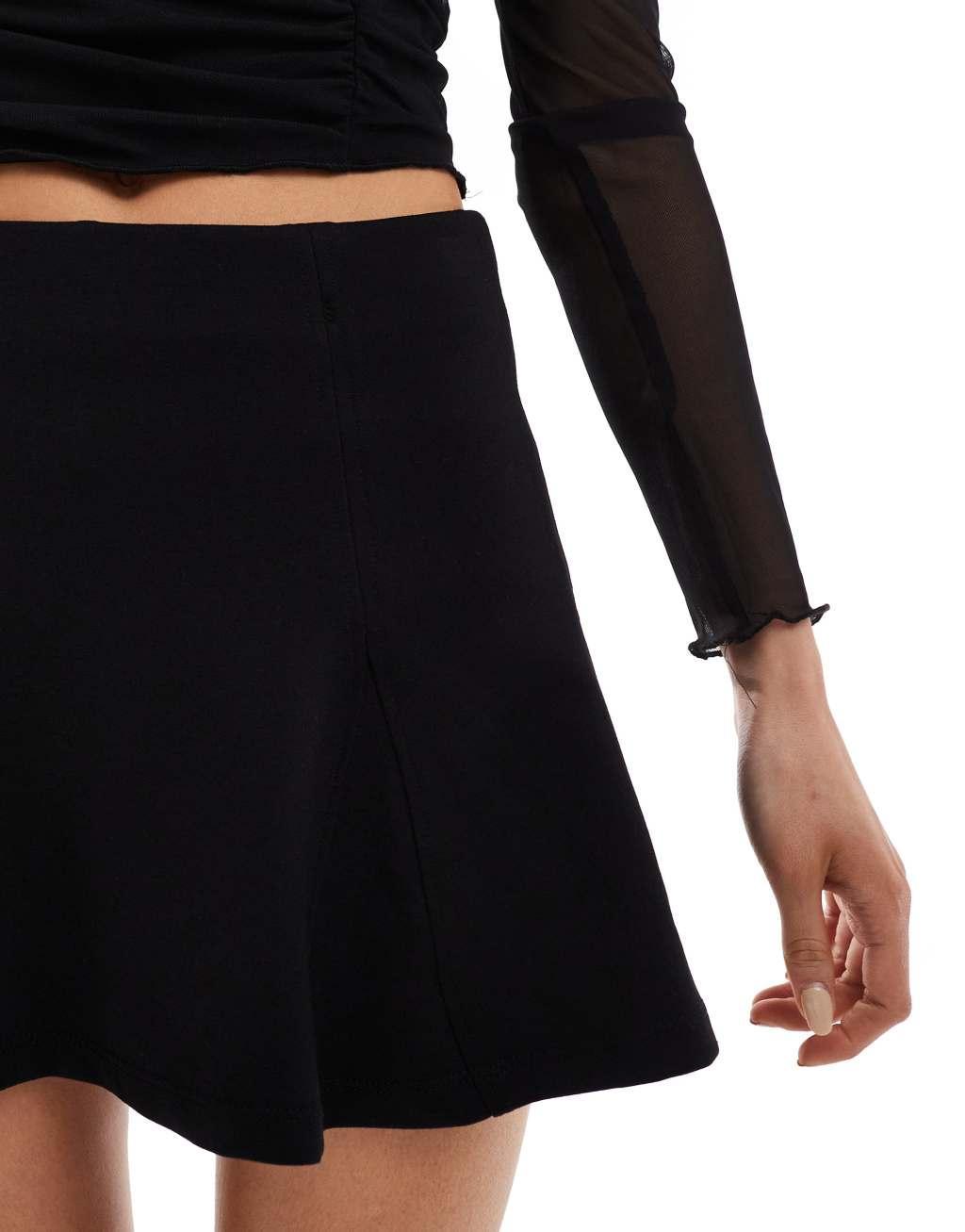 Bershka knit flippy mini skirt in black Product Image