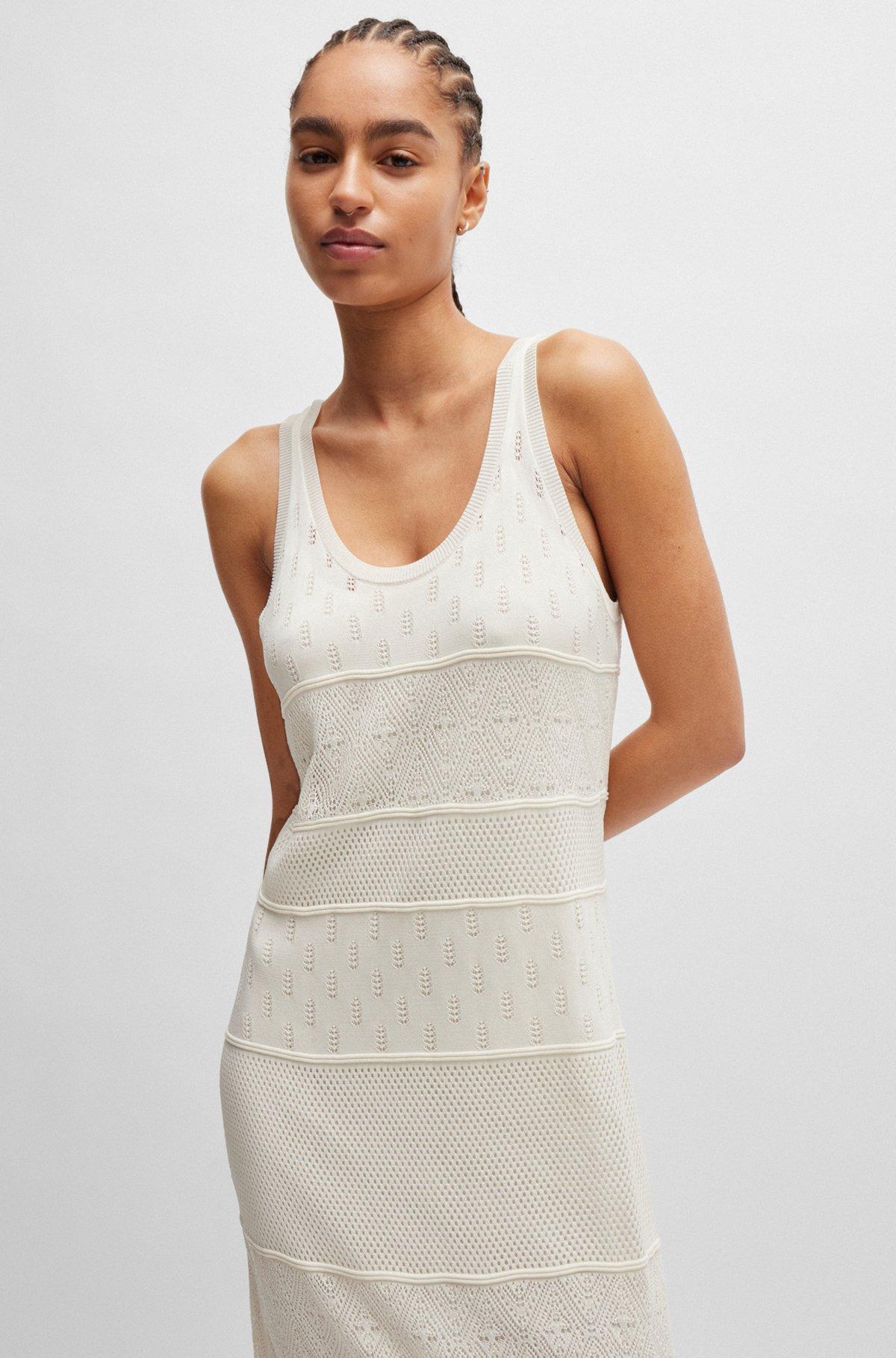 Knitted dress in midi length with mixed structures Product Image
