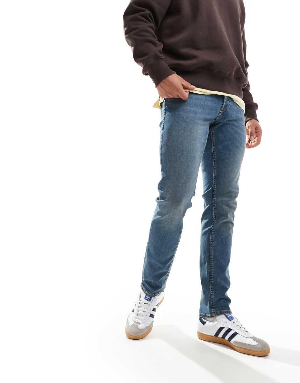 Jack & Jones glenn slim jean in mid wash blue Product Image