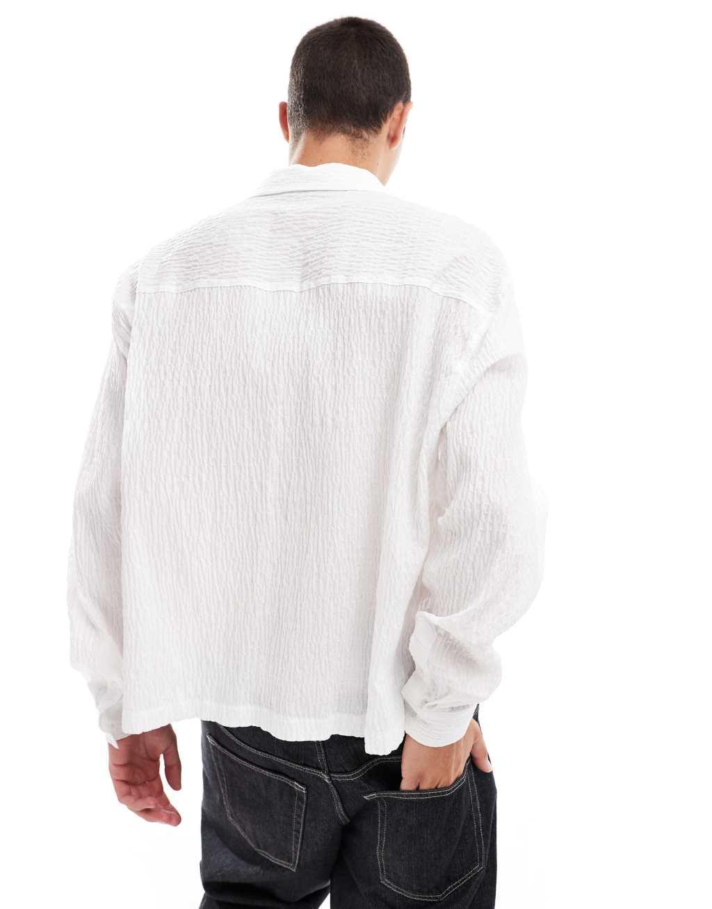ASOS DESIGN oversized boxy seersucker shirt in beige Product Image