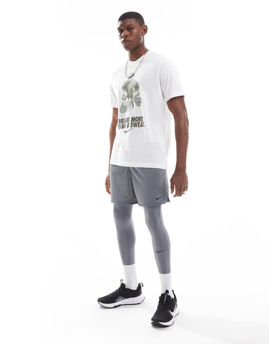 Nike Training IYKYK graphic T-shirt in white Product Image