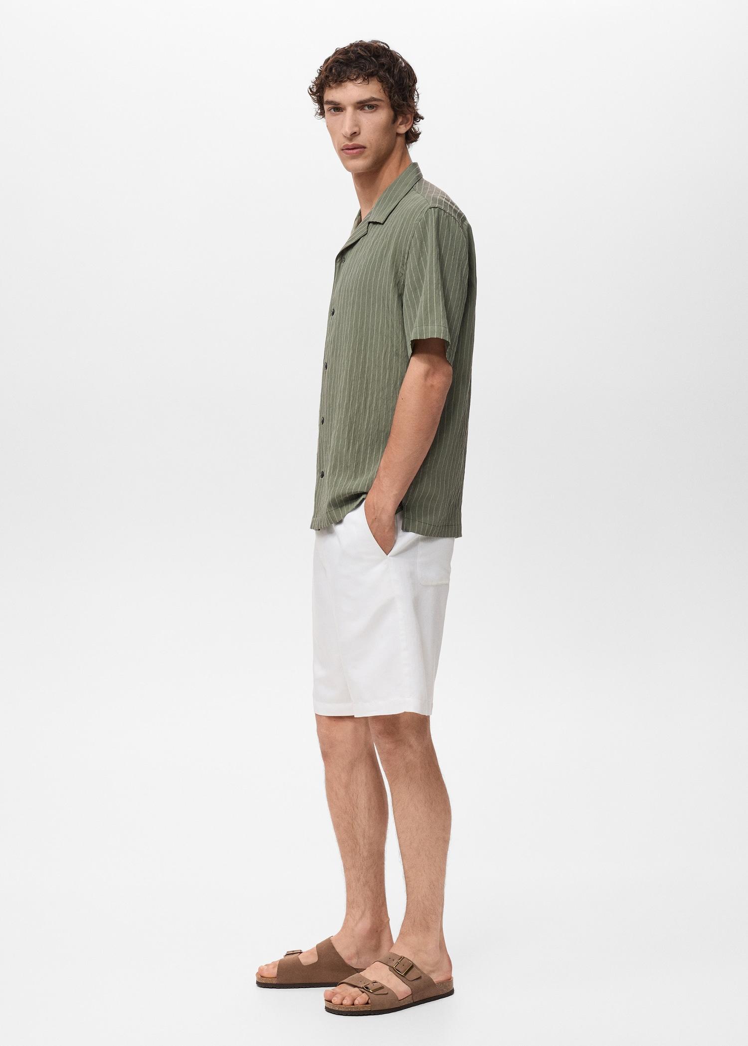 Short sleeve striped shirt - Men | MANGO USA Product Image
