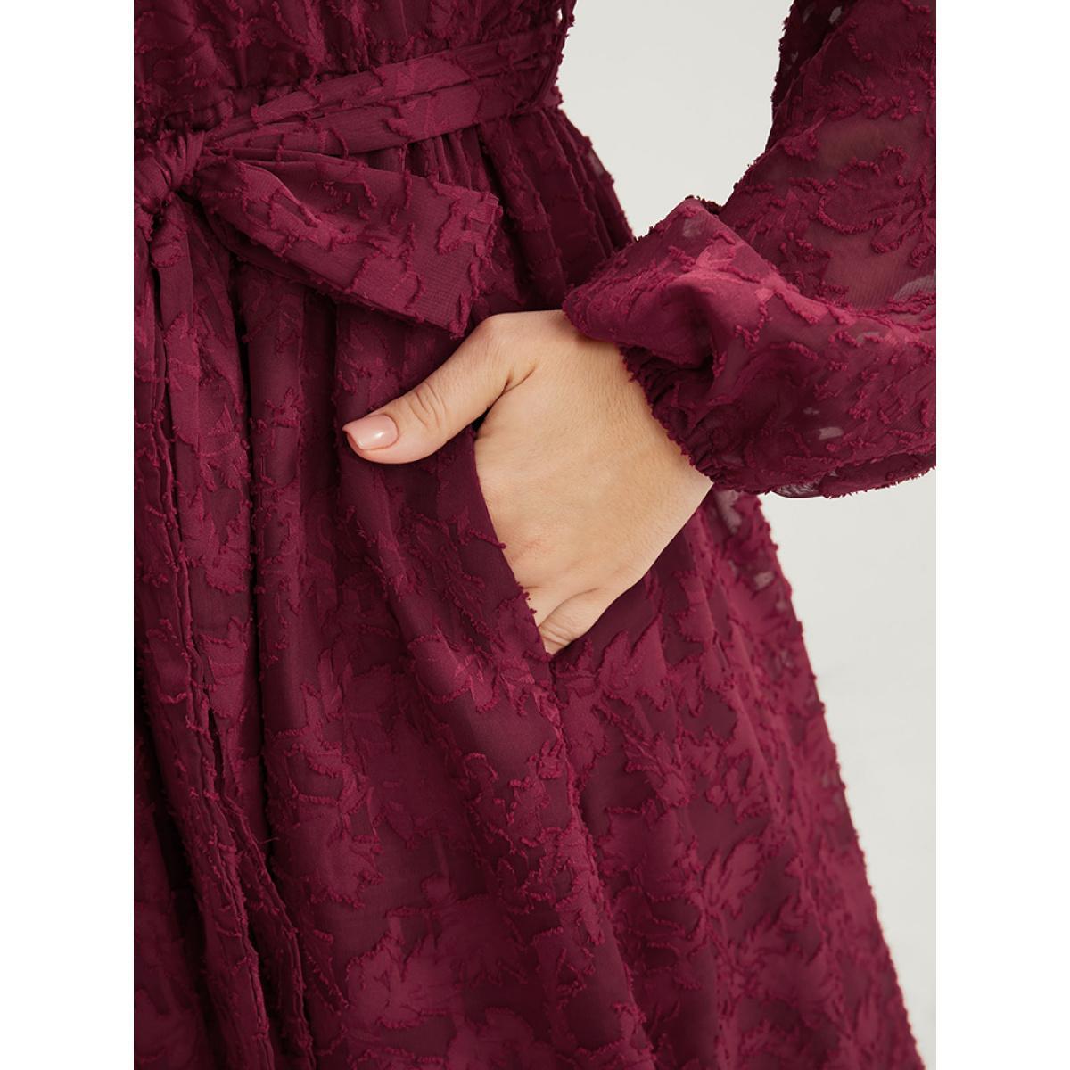 Plus Size Floral Pocket Lantern Sleeve Belted Surplice Neck Dress Scarlet Women Glamour Belted V-neck Long Sleeve Curvy Midi Dress BloomChic 28/5X Product Image