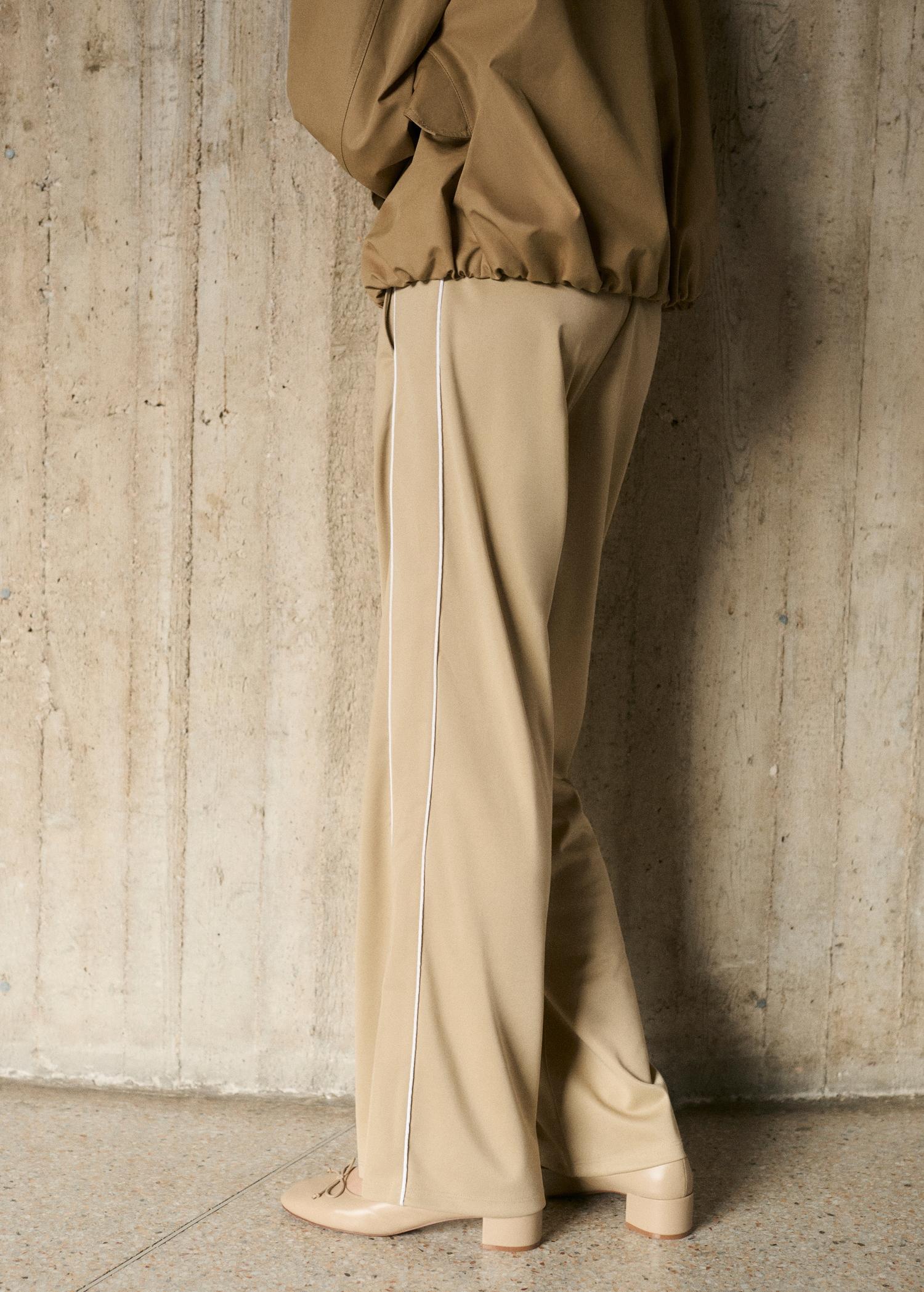 Contrasting-stripe jogger pants - Women | MANGO USA Product Image