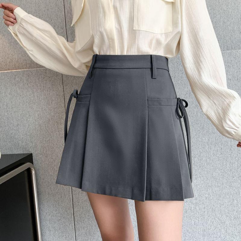 High Rise Plain Pleated Tie-Up Mini A-Line Skirt Product Image