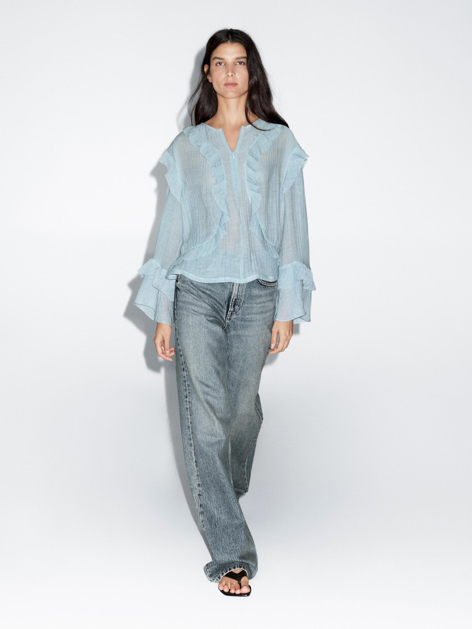 Flowing blouse with ruffles Product Image