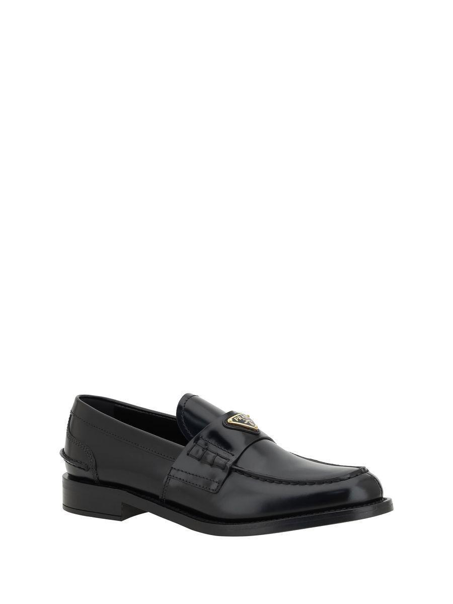 PRADA Triangle Logo Brushed Leather Loafers In Black Product Image